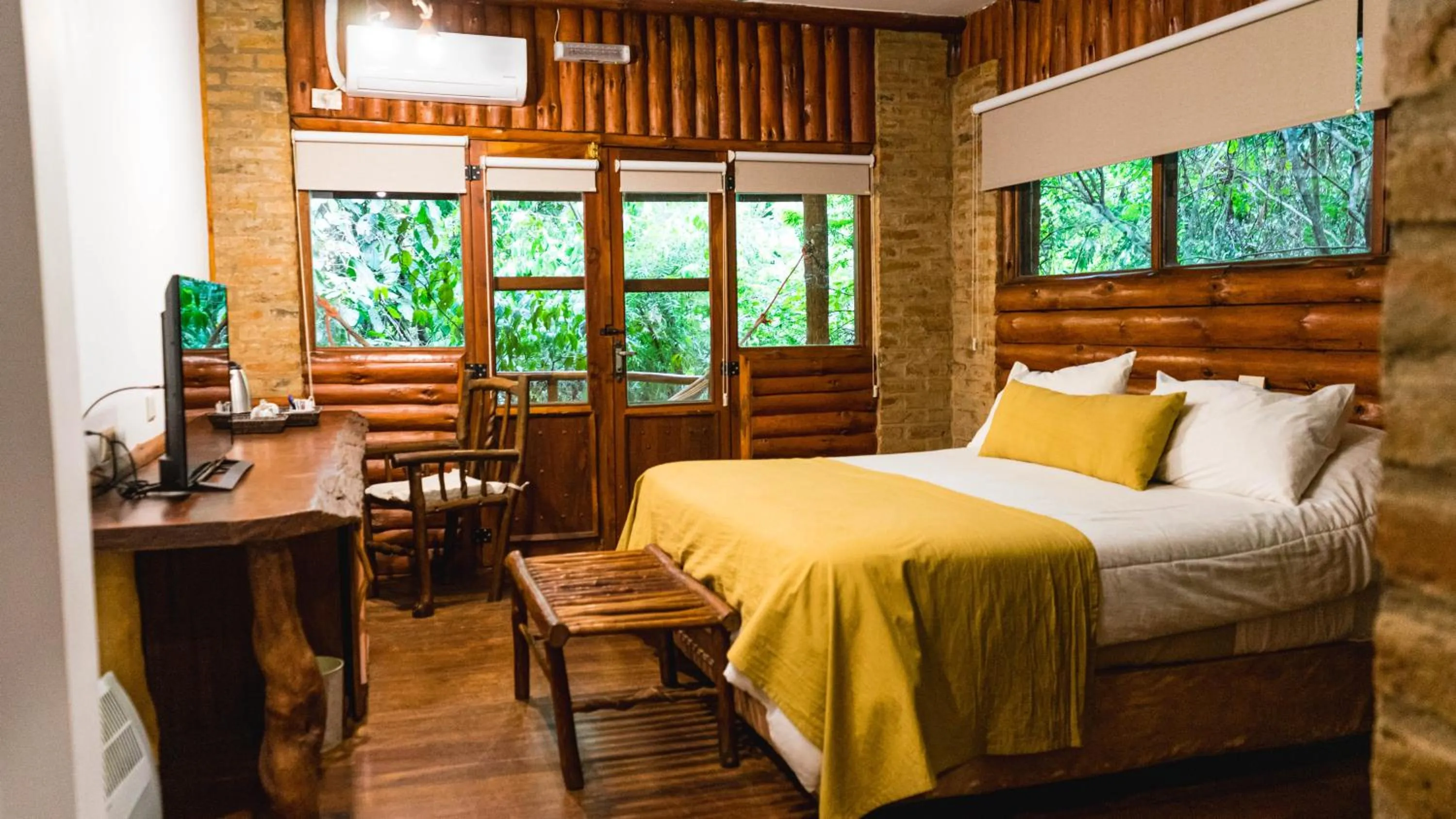 Bed in La Aldea De La Selva Lodge