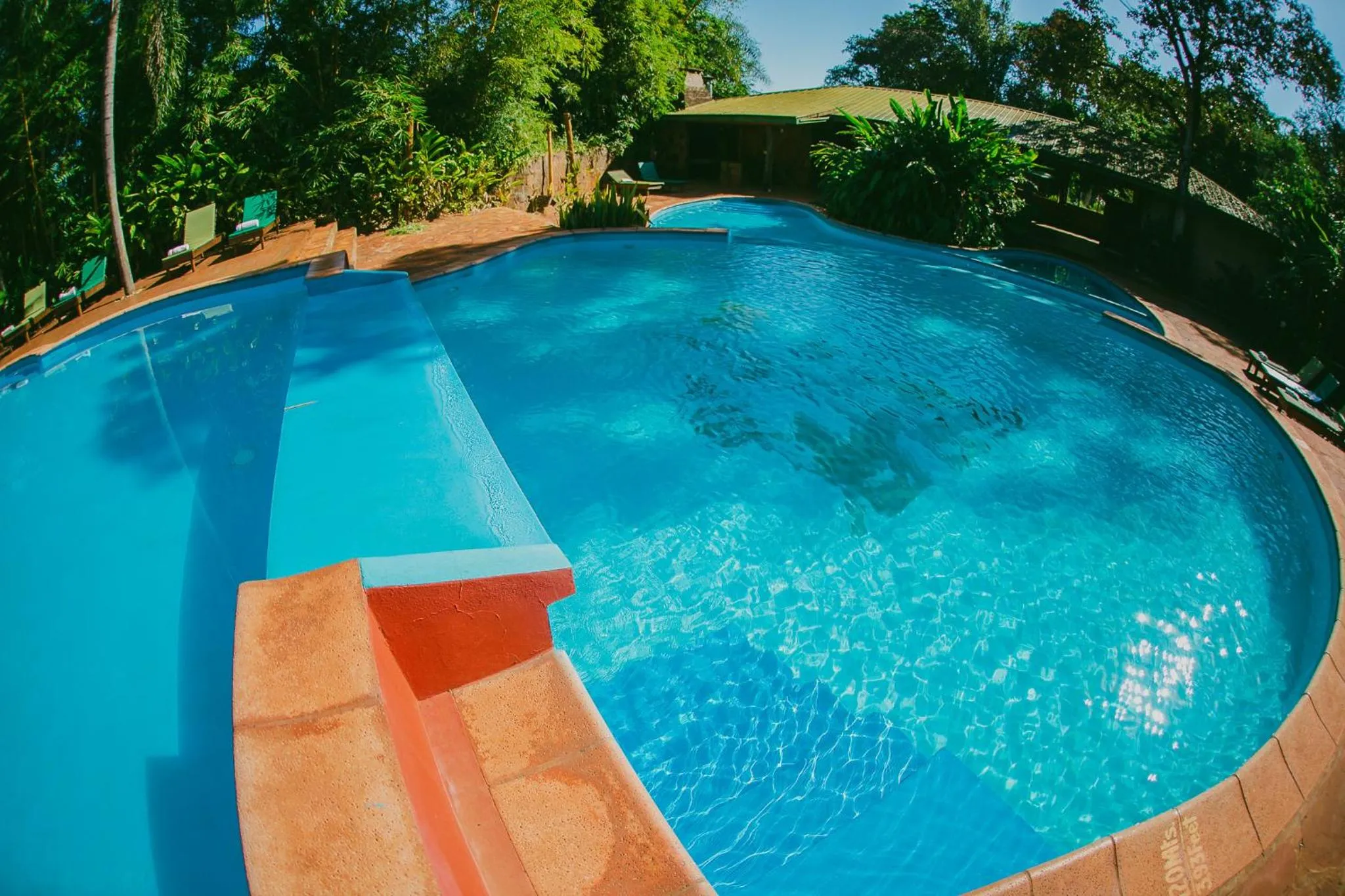 Swimming pool in La Aldea De La Selva Lodge