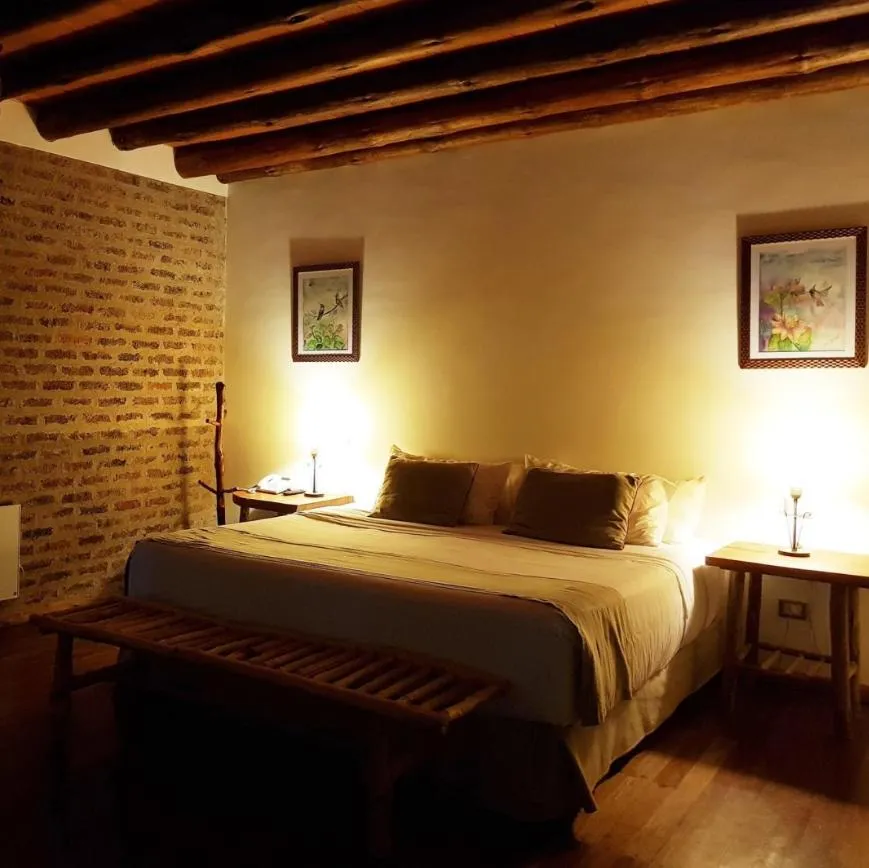 Bed in La Aldea De La Selva Lodge