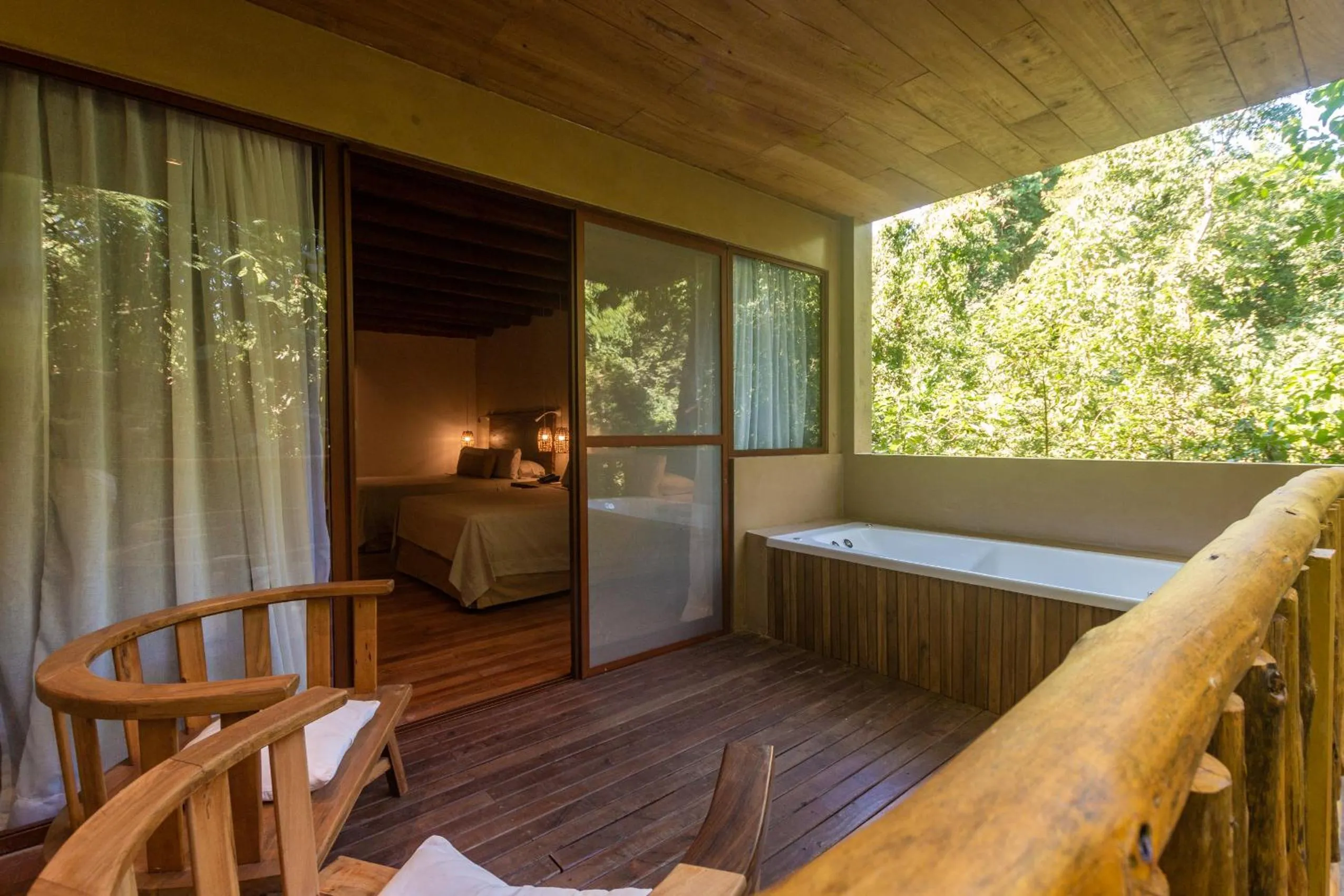 Balcony/Terrace, Bed in La Aldea De La Selva Lodge
