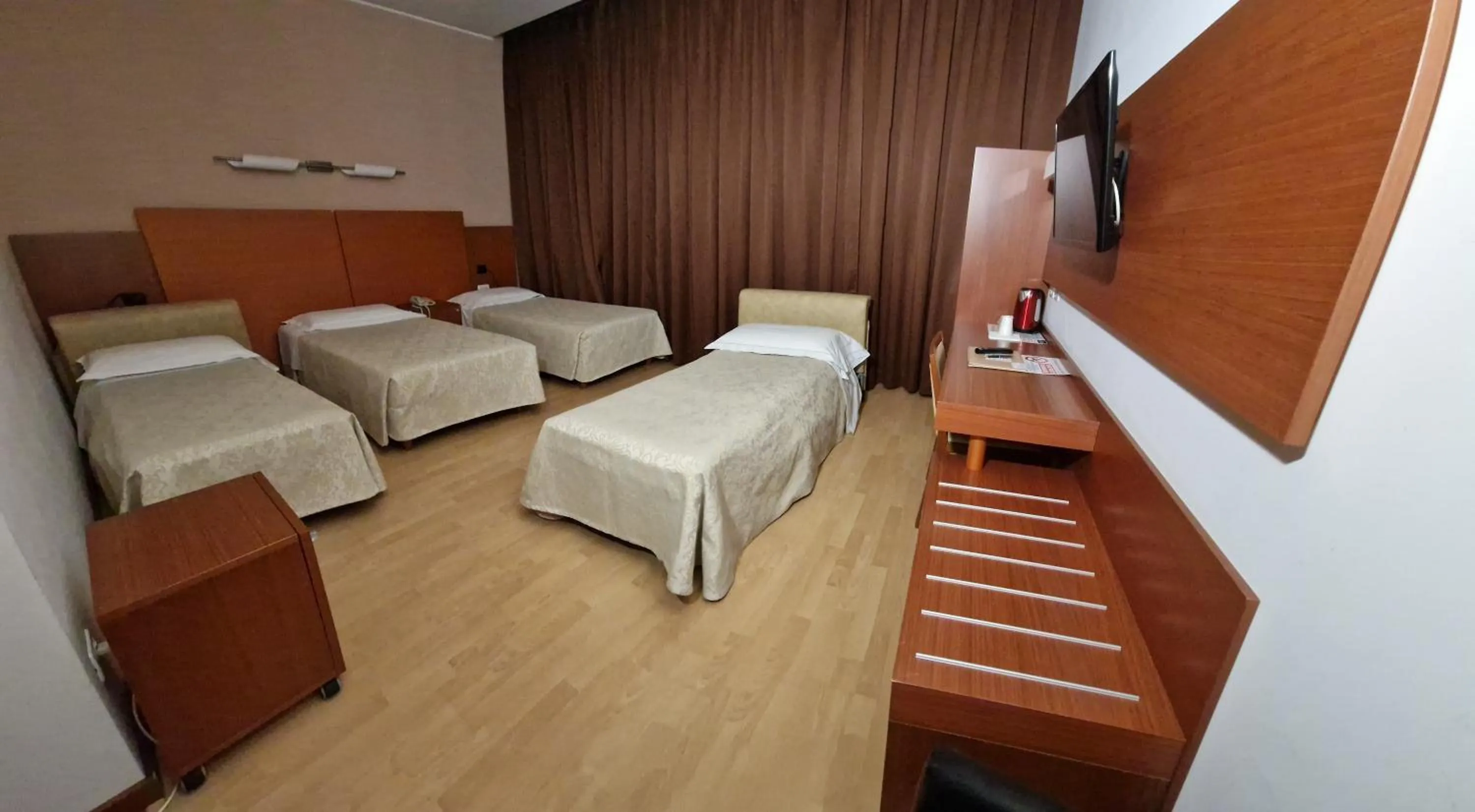 Bed in Bella Italia Palace Hotel