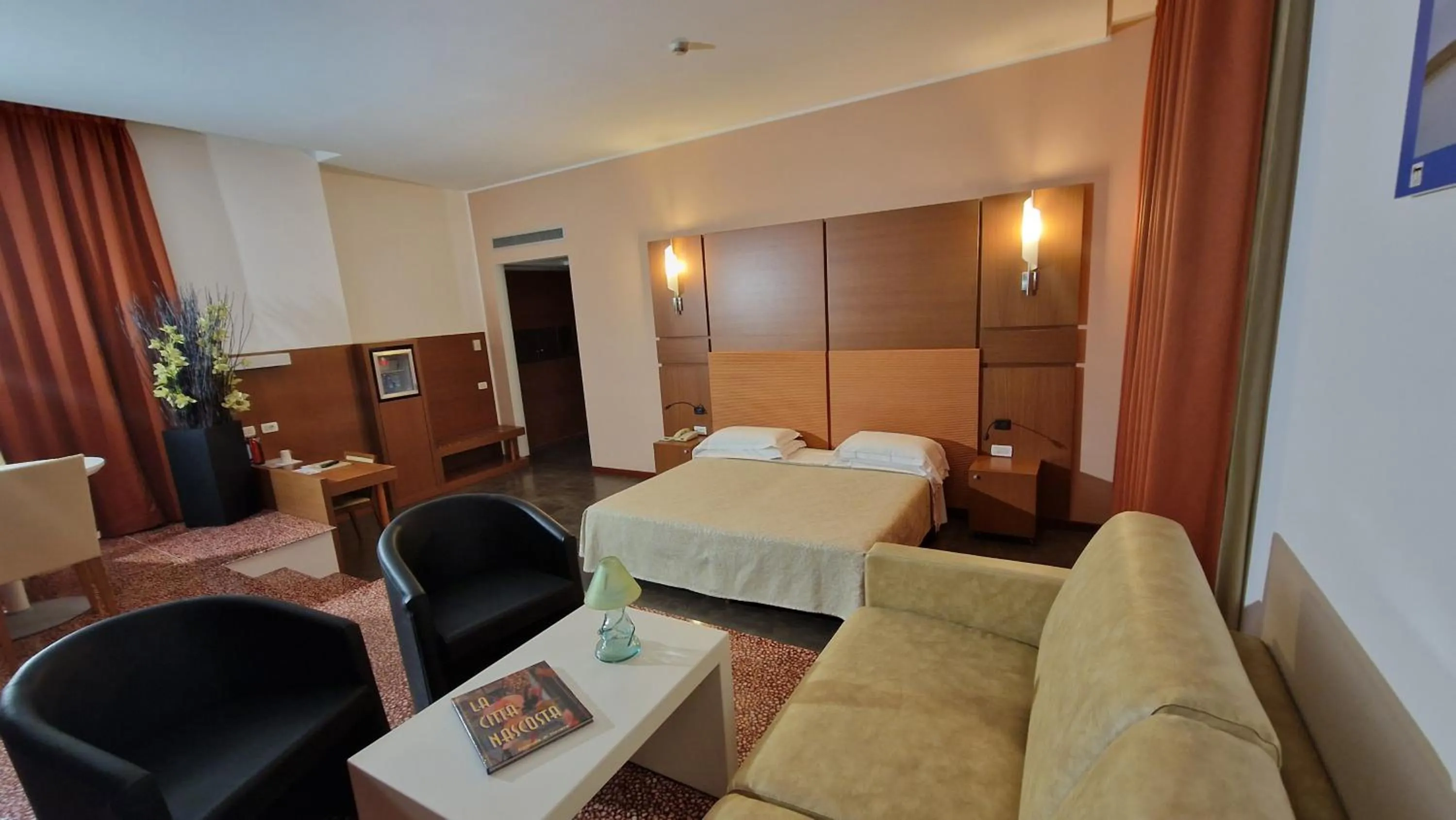 Seating area in Bella Italia Palace Hotel