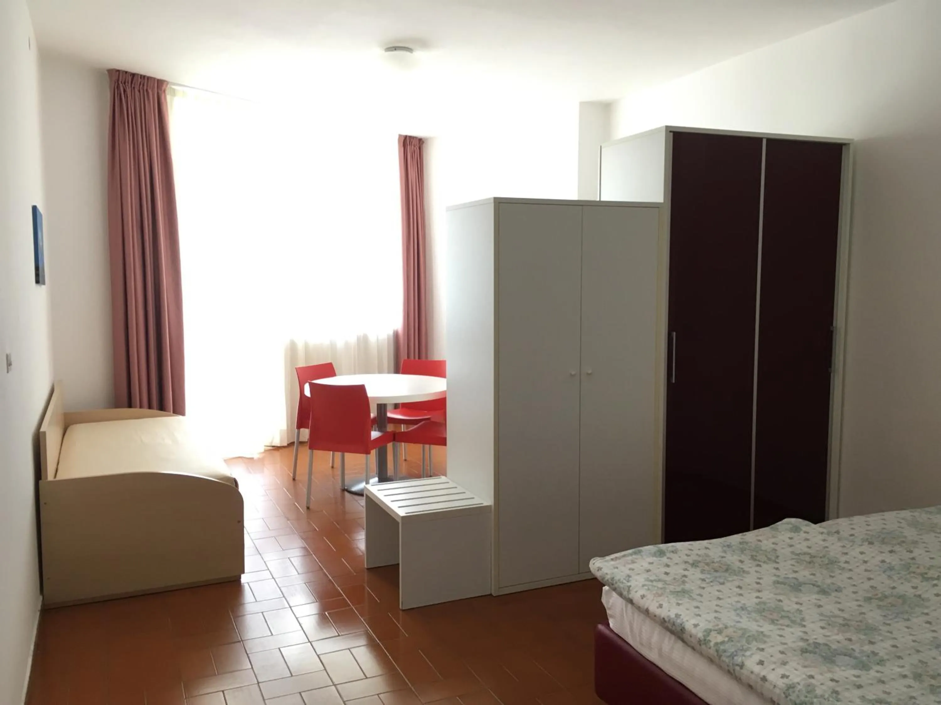 Living room, Bed in Appartamenti Wieland