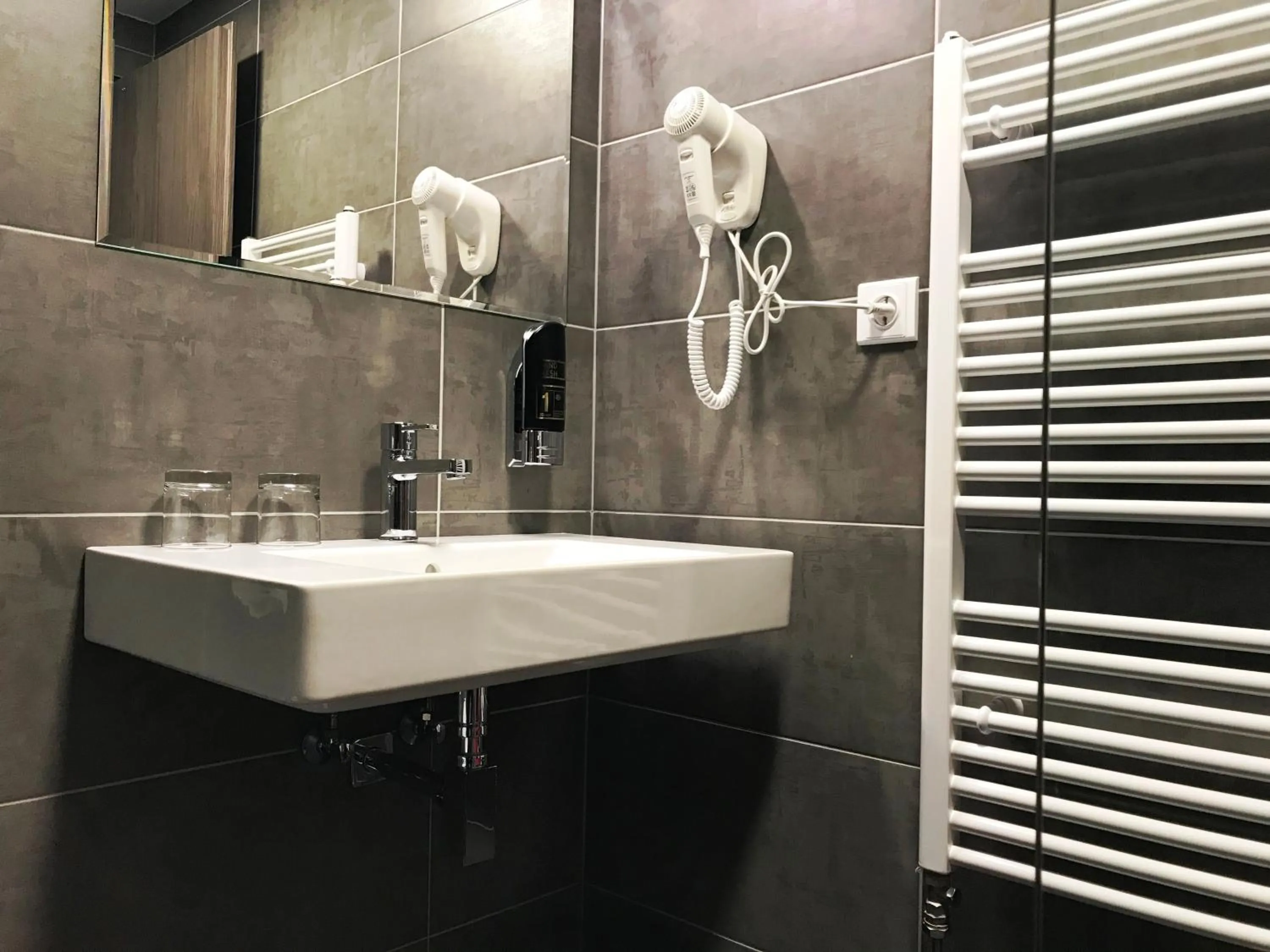 Bathroom in Hotel Atrium