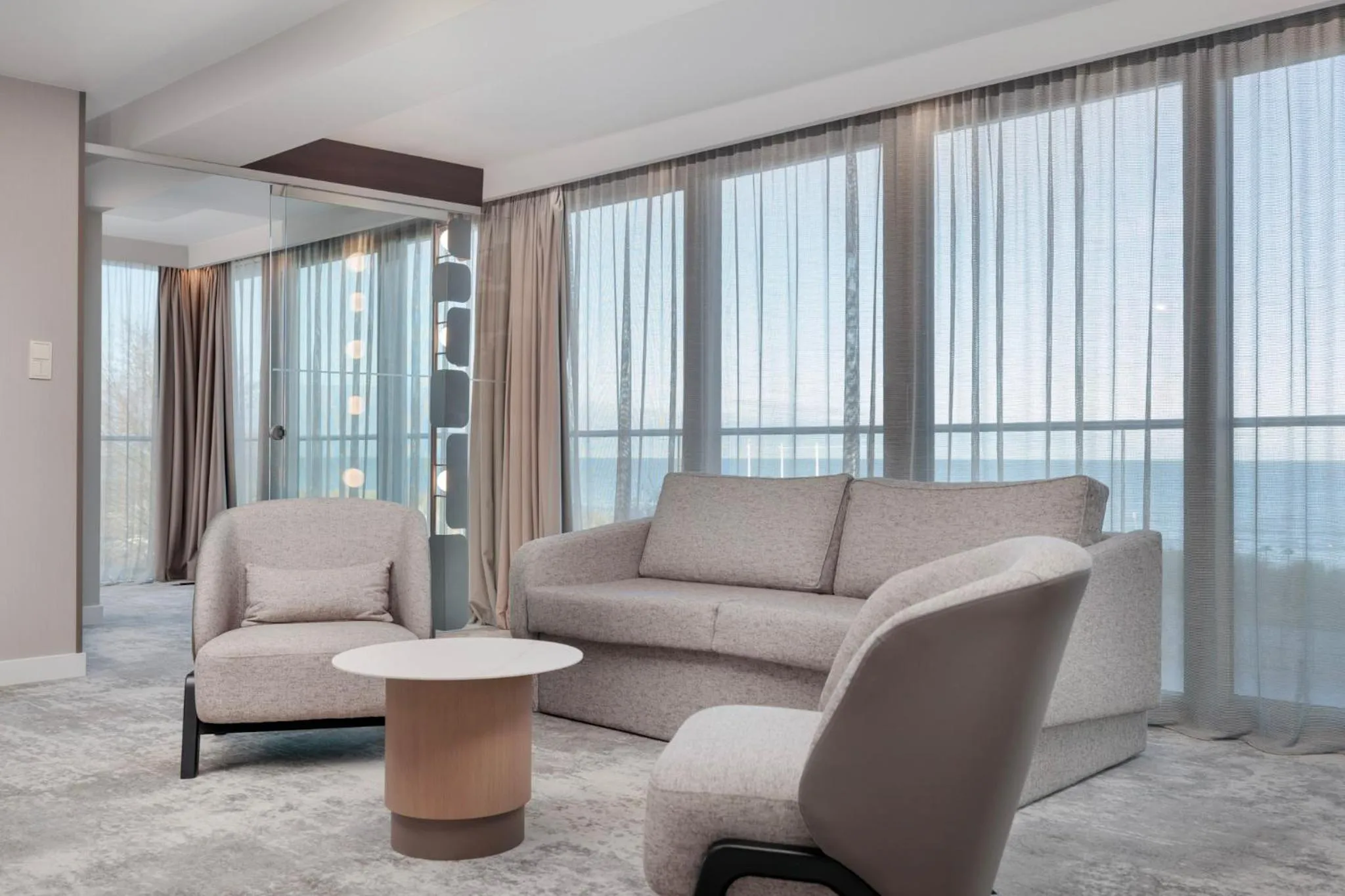 Living room in Marine Hotel by Zdrojowa