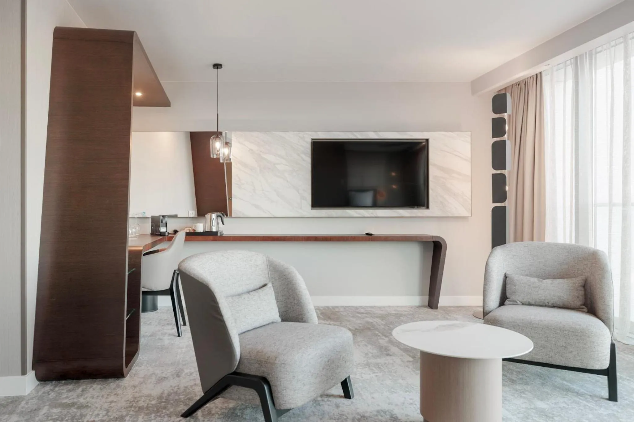 Living room in Marine Hotel by Zdrojowa