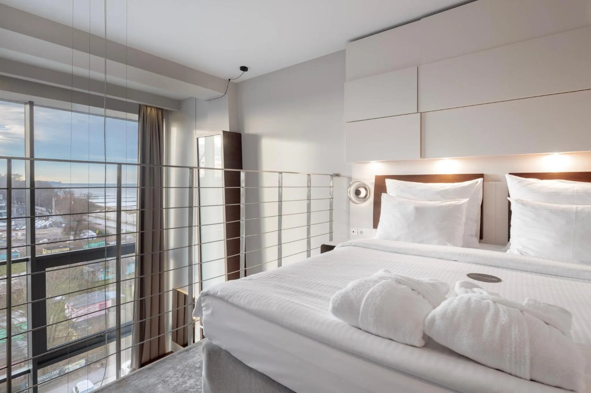 Bed in Marine Hotel by Zdrojowa