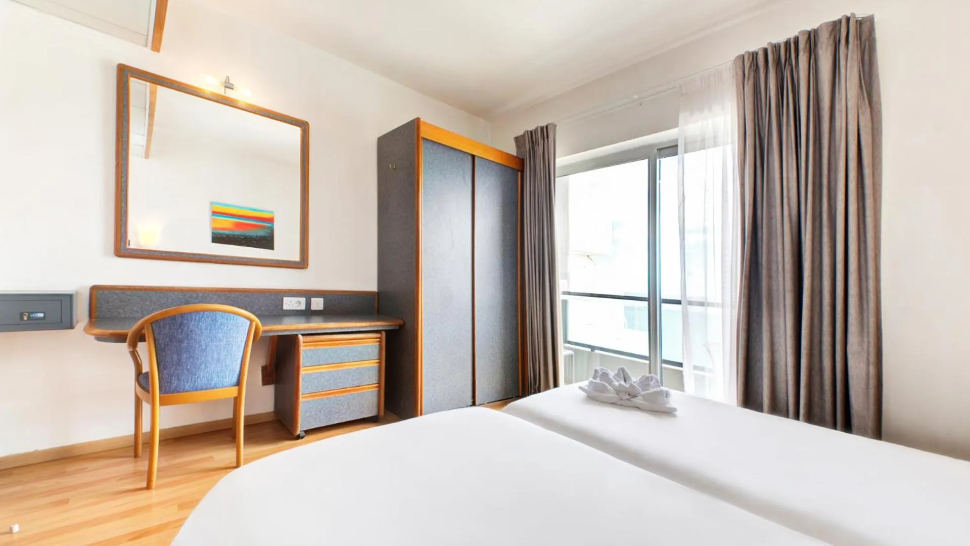 Bed in AX Sunny Coast Resort & Spa