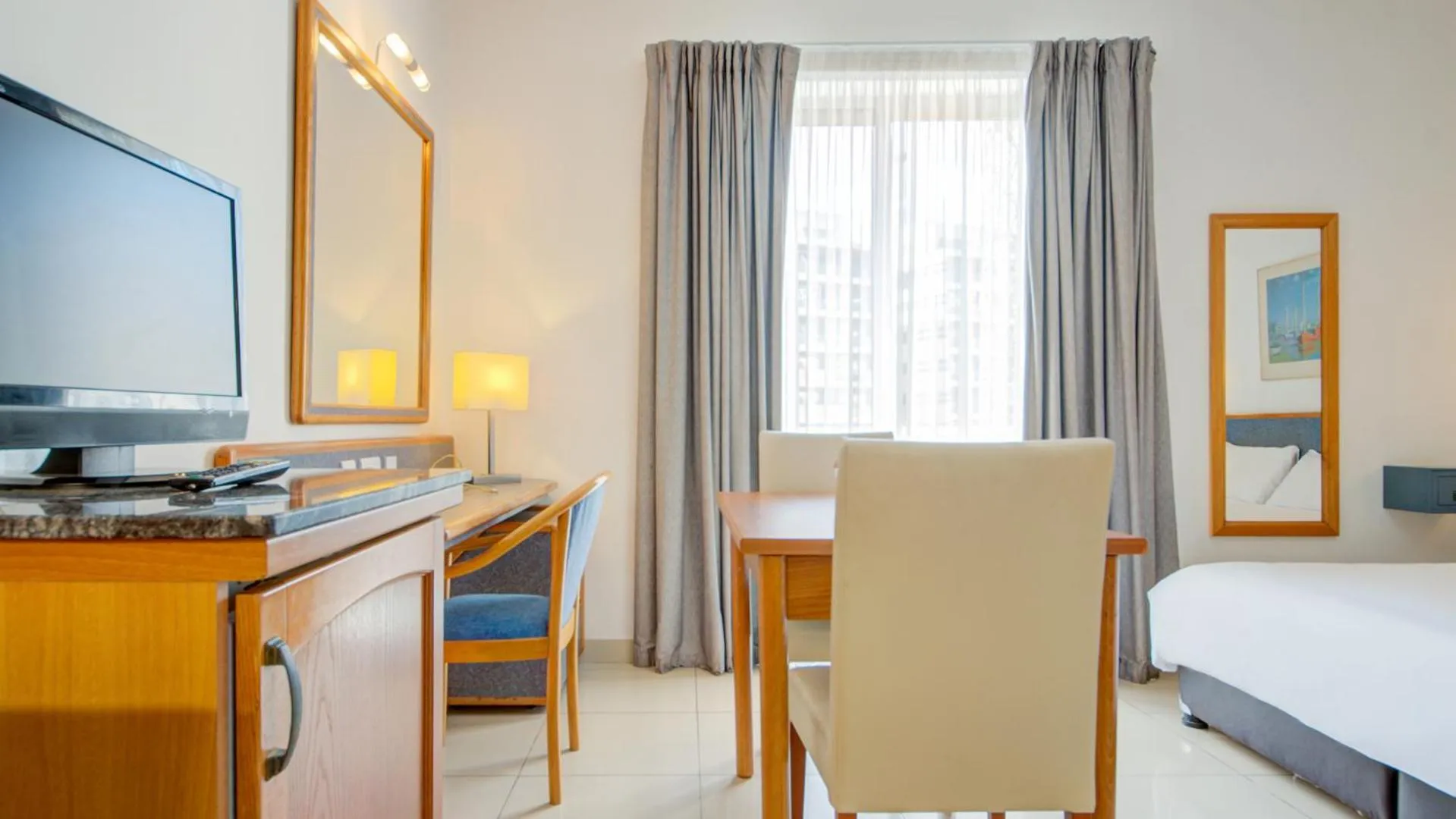 Living room, Bed in AX Sunny Coast Resort & Spa