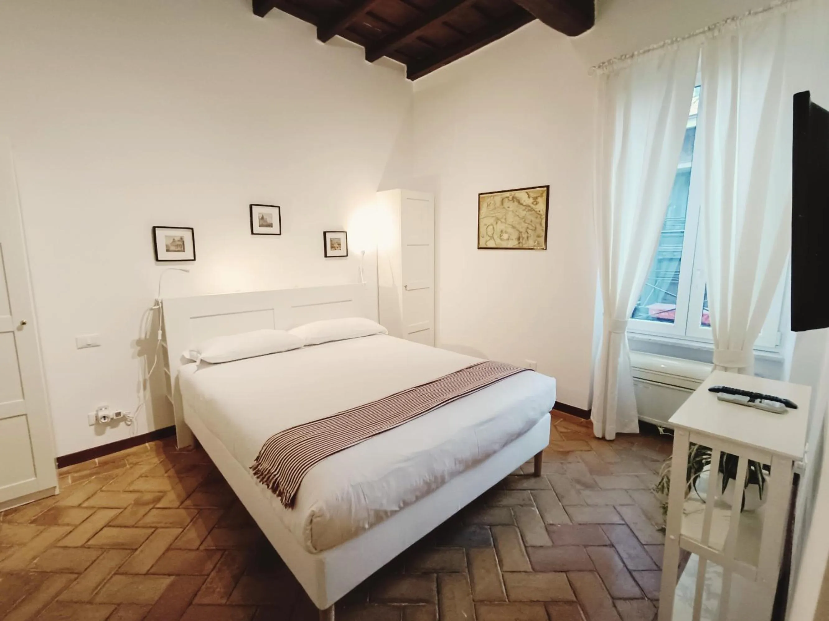 Bed in Piccolo Trevi Suites