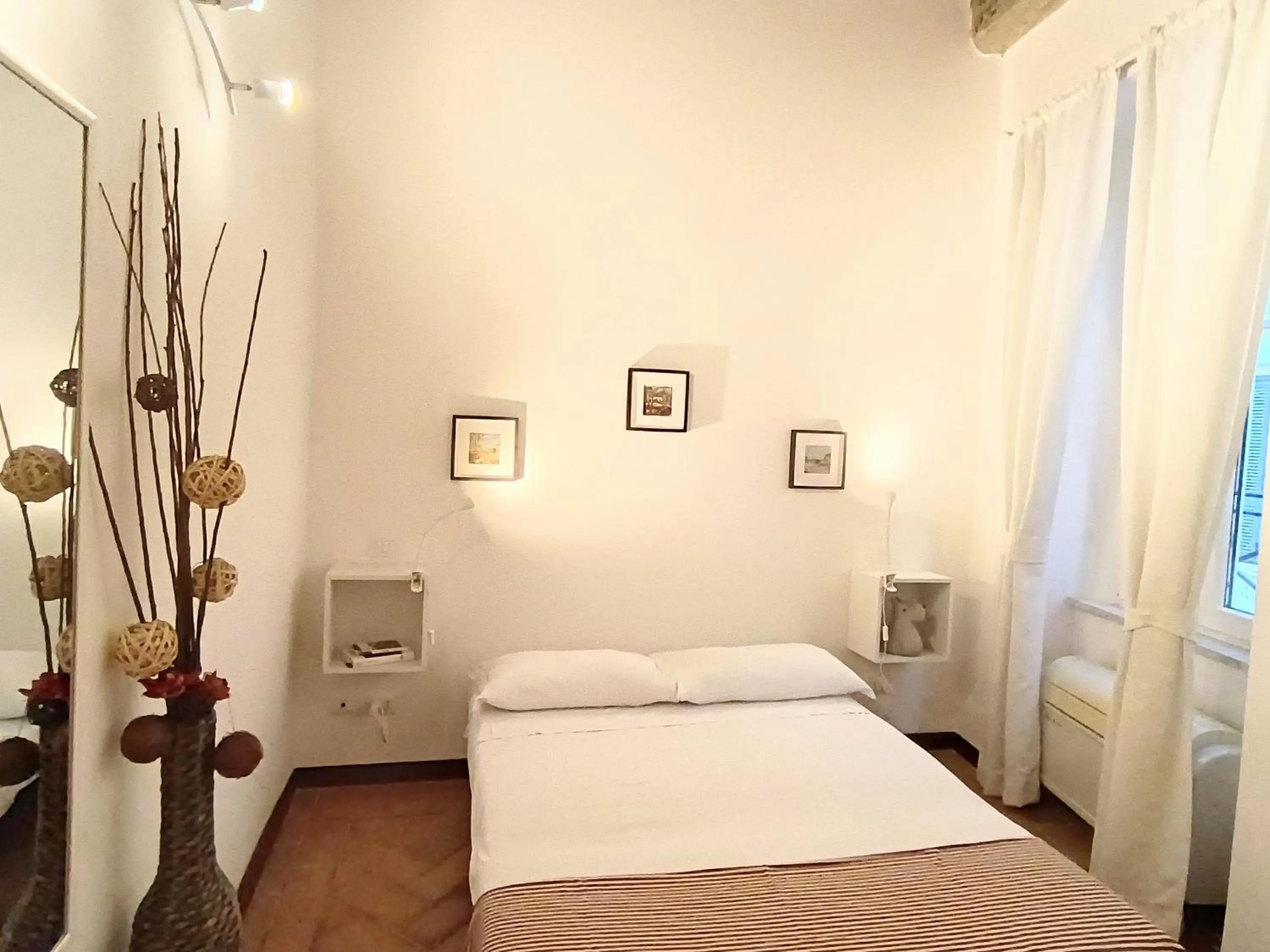 Bed in Piccolo Trevi Suites