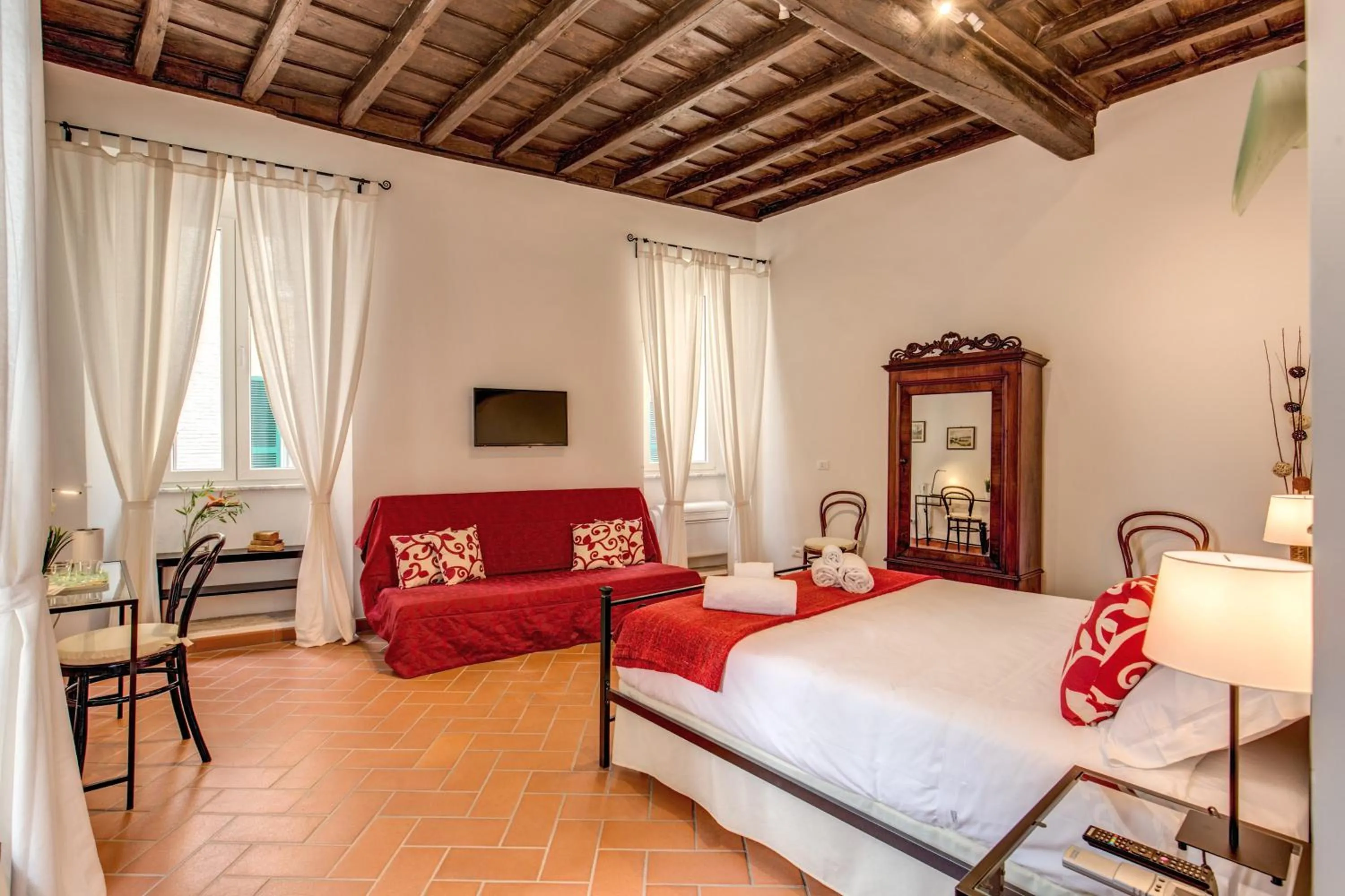 Bed in Piccolo Trevi Suites