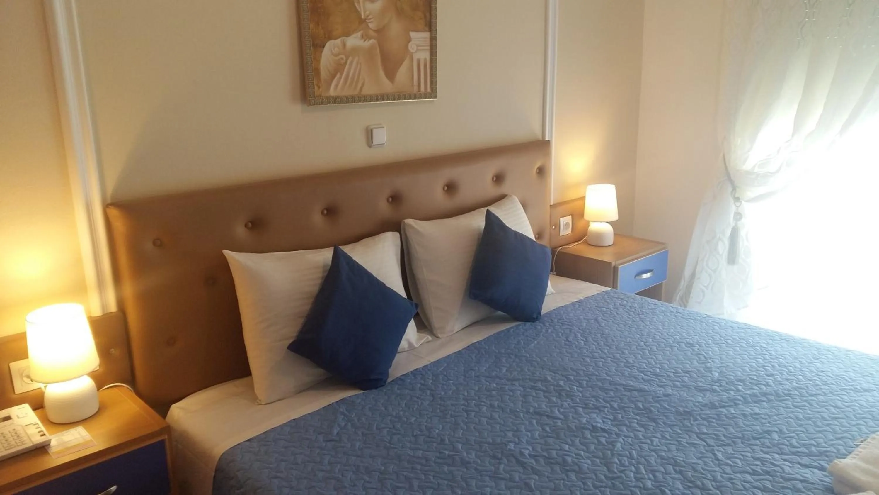 Bed in Pantheon Deluxe Apartments