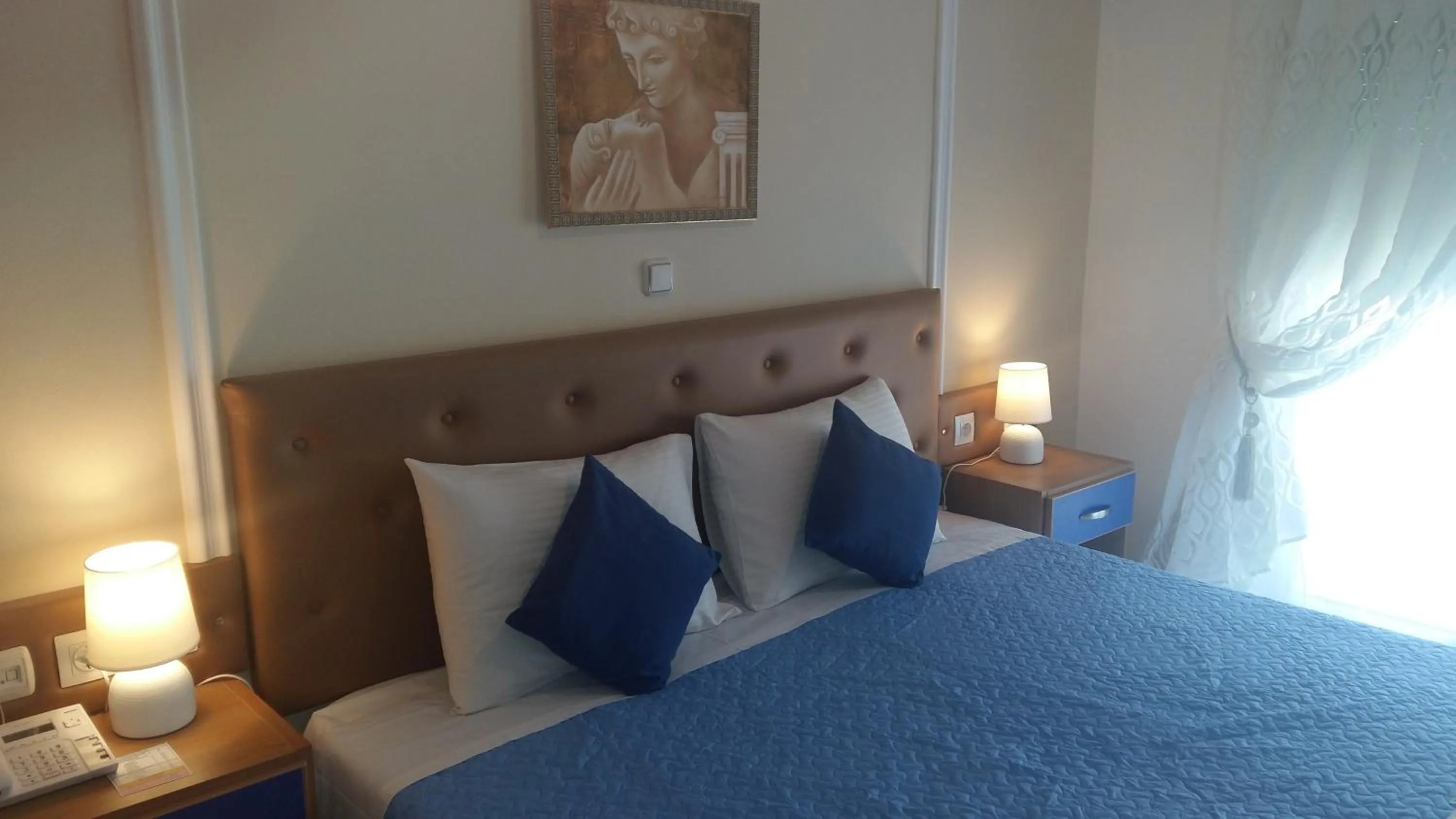 Bed in Pantheon Deluxe Apartments