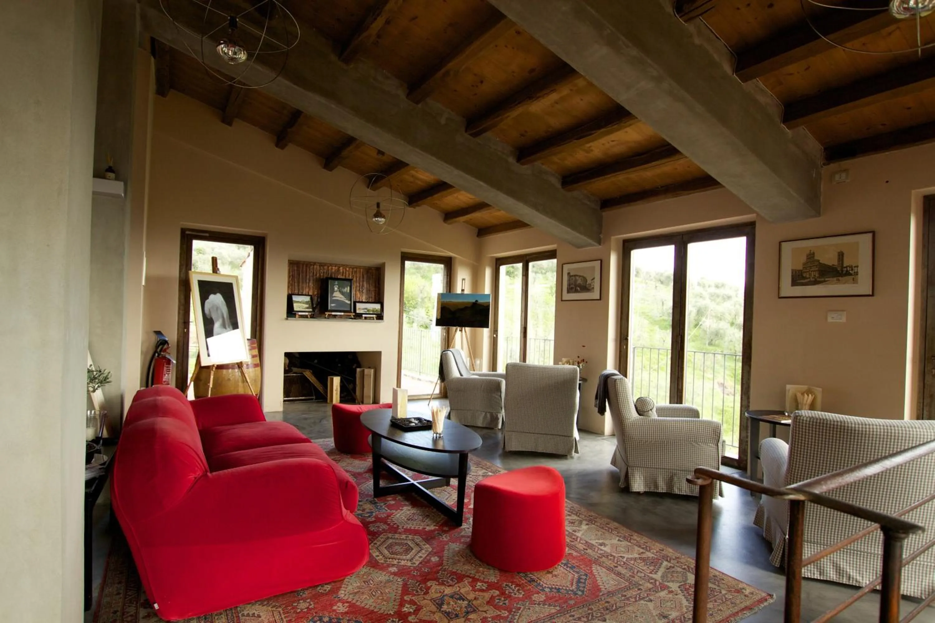 Communal lounge/ TV room in Tenuta San Pietro Luxury Hotel