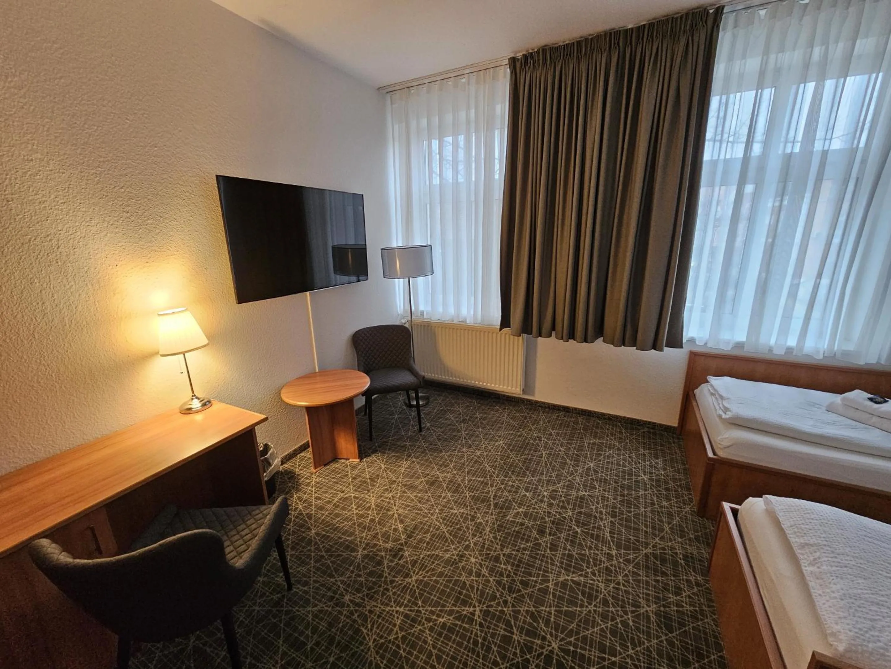 Bedroom, Bed in Parkhotel Senftenberg