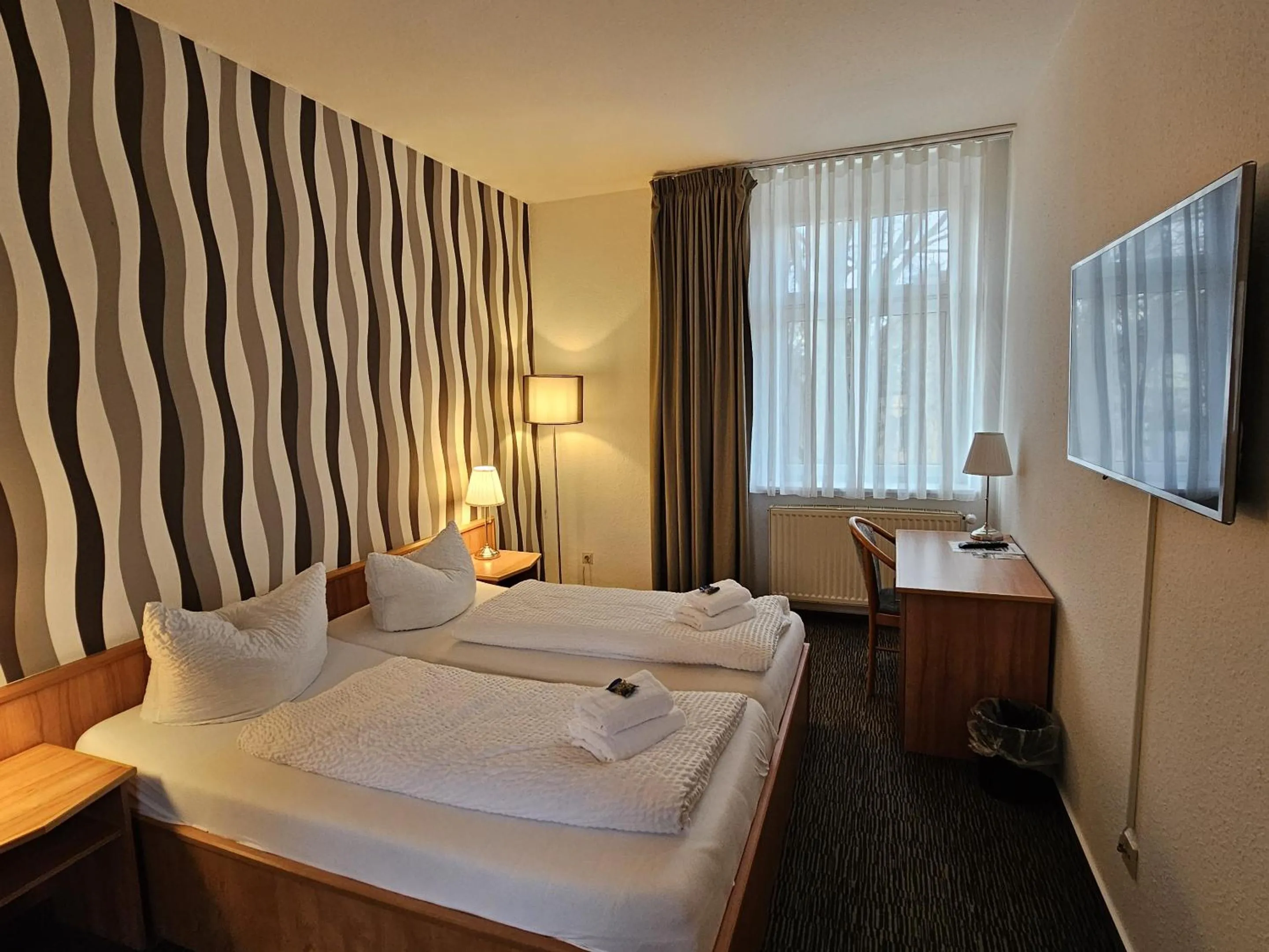 Bedroom, Bed in Parkhotel Senftenberg