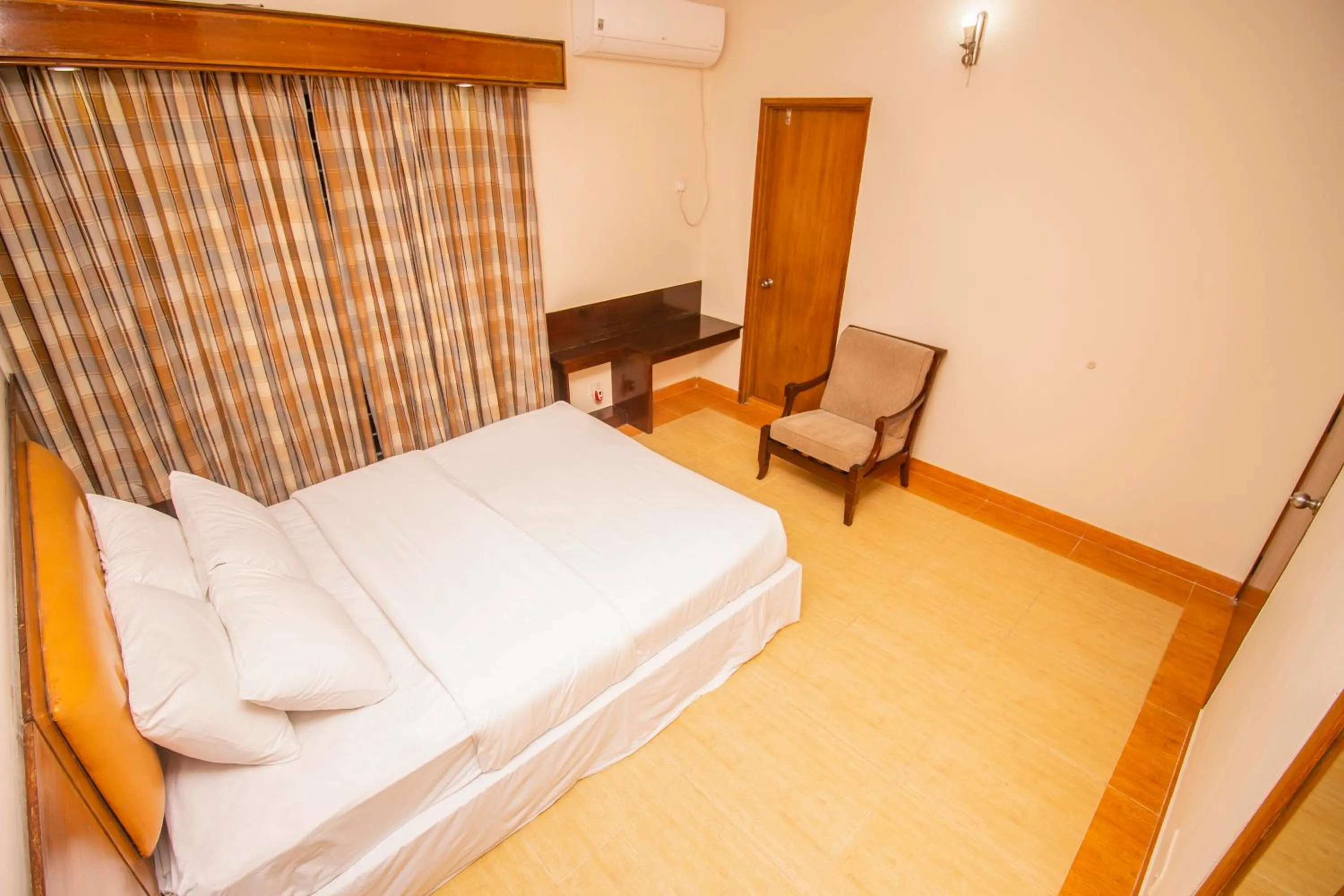 Bed in Rafflesia Serviced Apartments