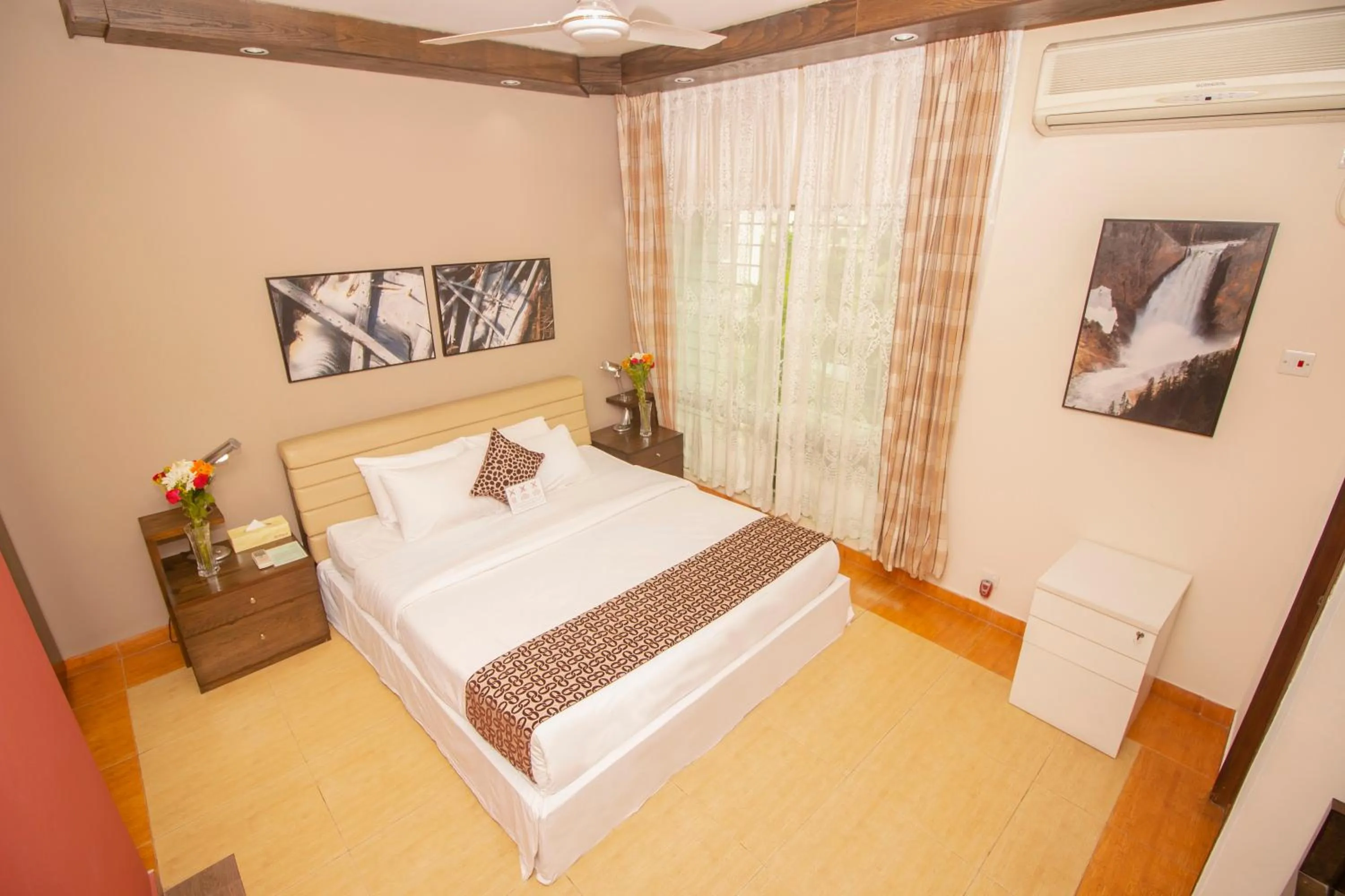 Living room, Bed in Rafflesia Serviced Apartments