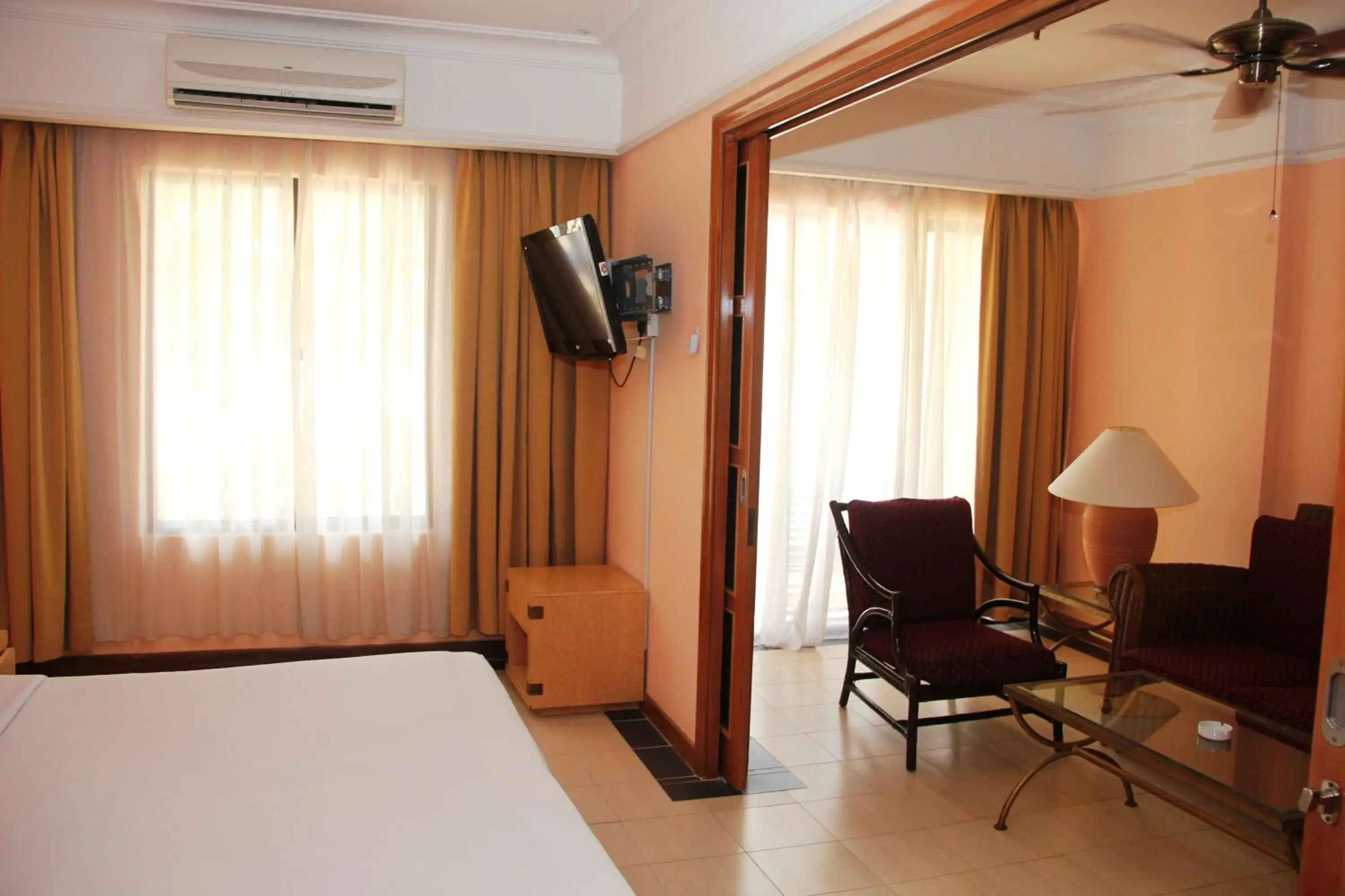 Bed, TV/Entertainment Center in Corus Paradise Resort Port Dickson