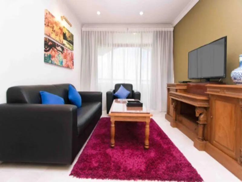 Living room in Century Bay Private Residences