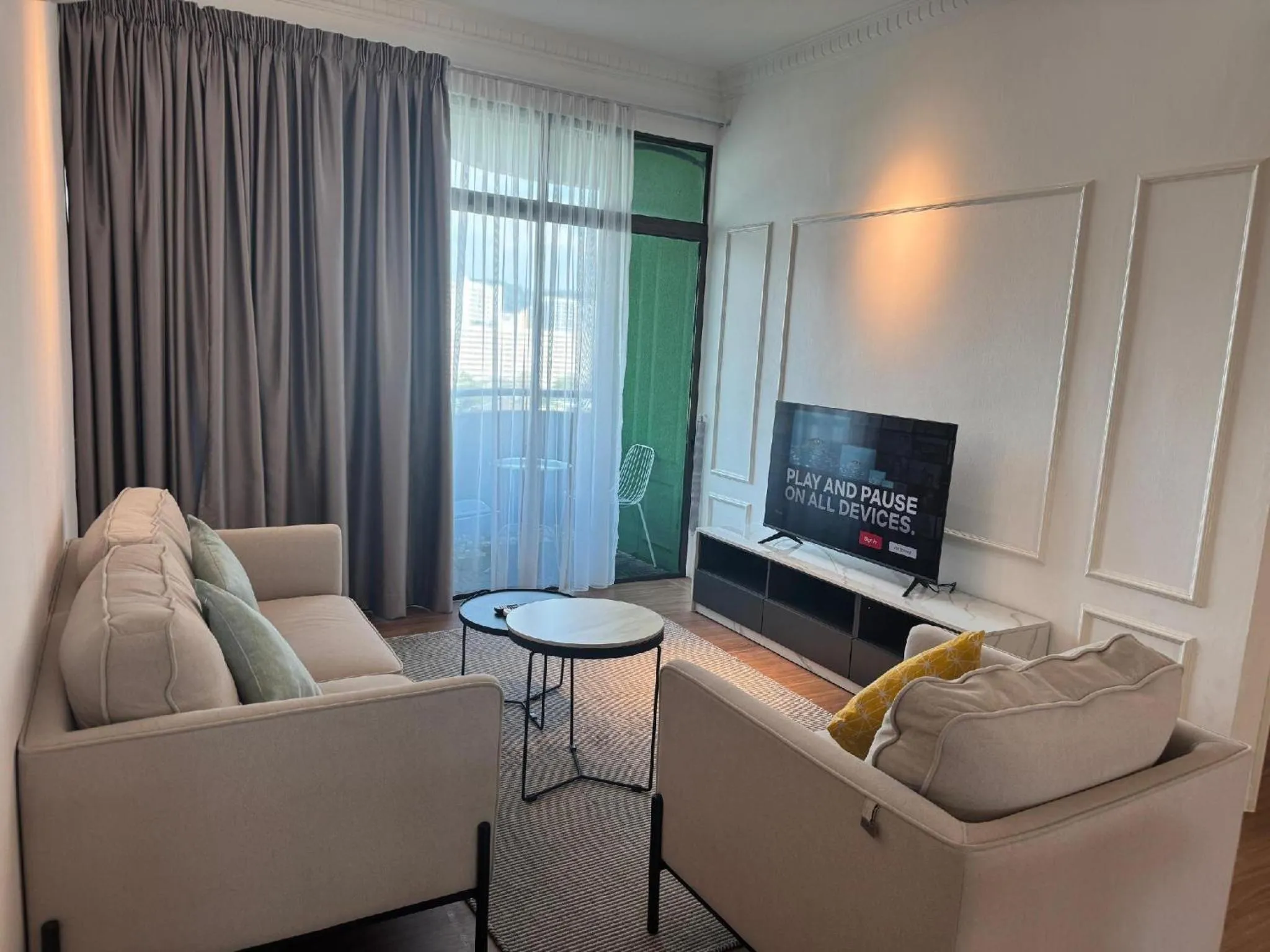 Living room in Century Bay Private Residences