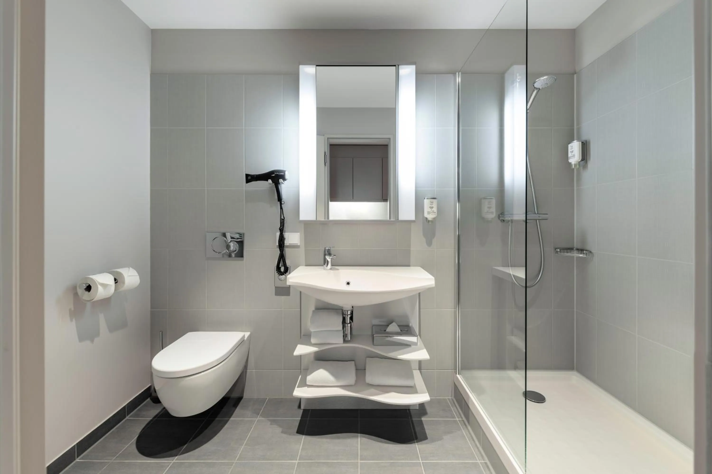 Toilet in Aparthotel Adagio Frankfurt City Messe