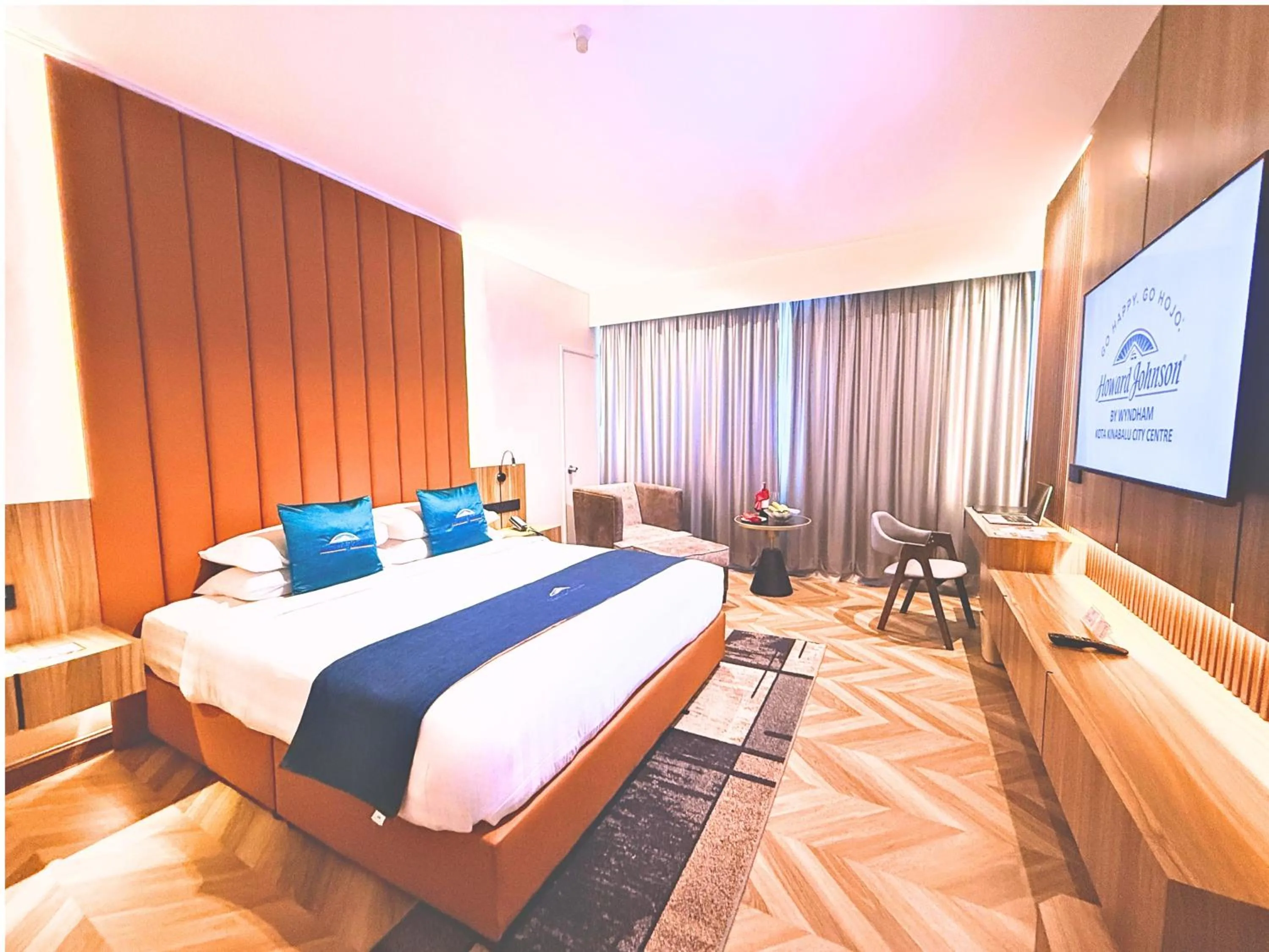 Bed in Howard Johnson by Wyndham Kota Kinabalu City Centre, formerly Hotel Shangri-La Kota Kinabalu