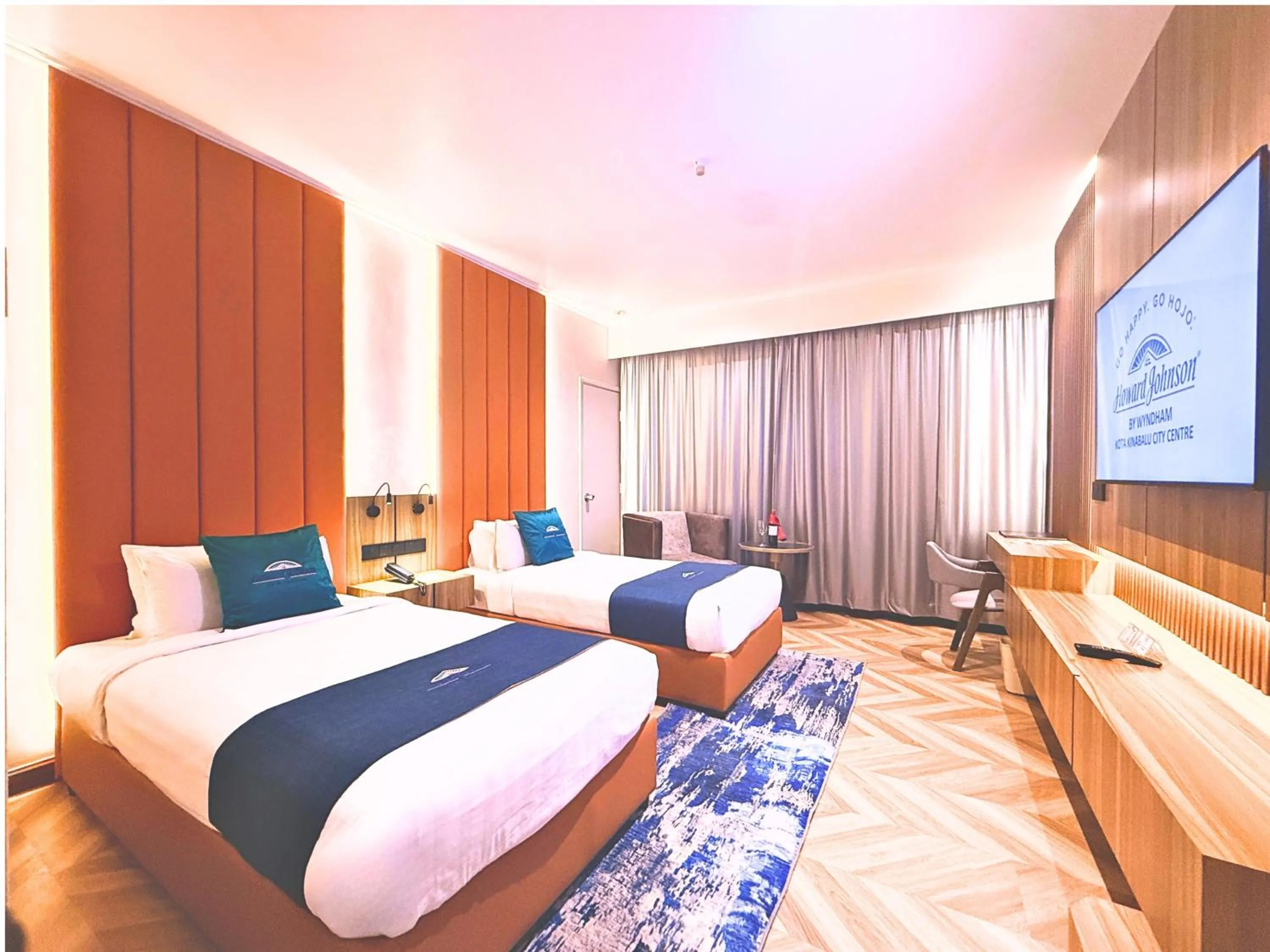 Bed in Howard Johnson by Wyndham Kota Kinabalu City Centre, formerly Hotel Shangri-La Kota Kinabalu