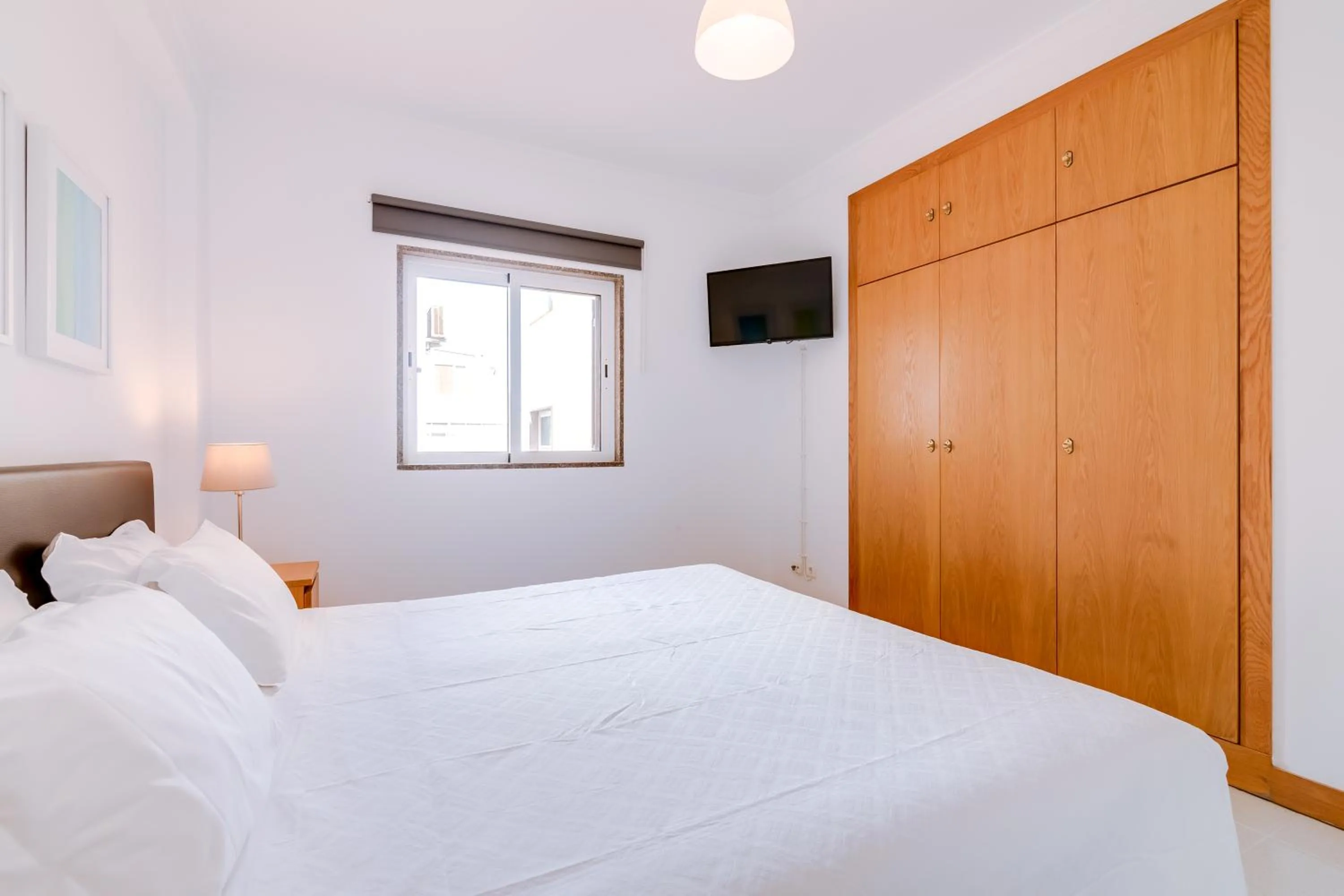 TV and multimedia, Bed in AL- Apartamentos Novos Vista Mar