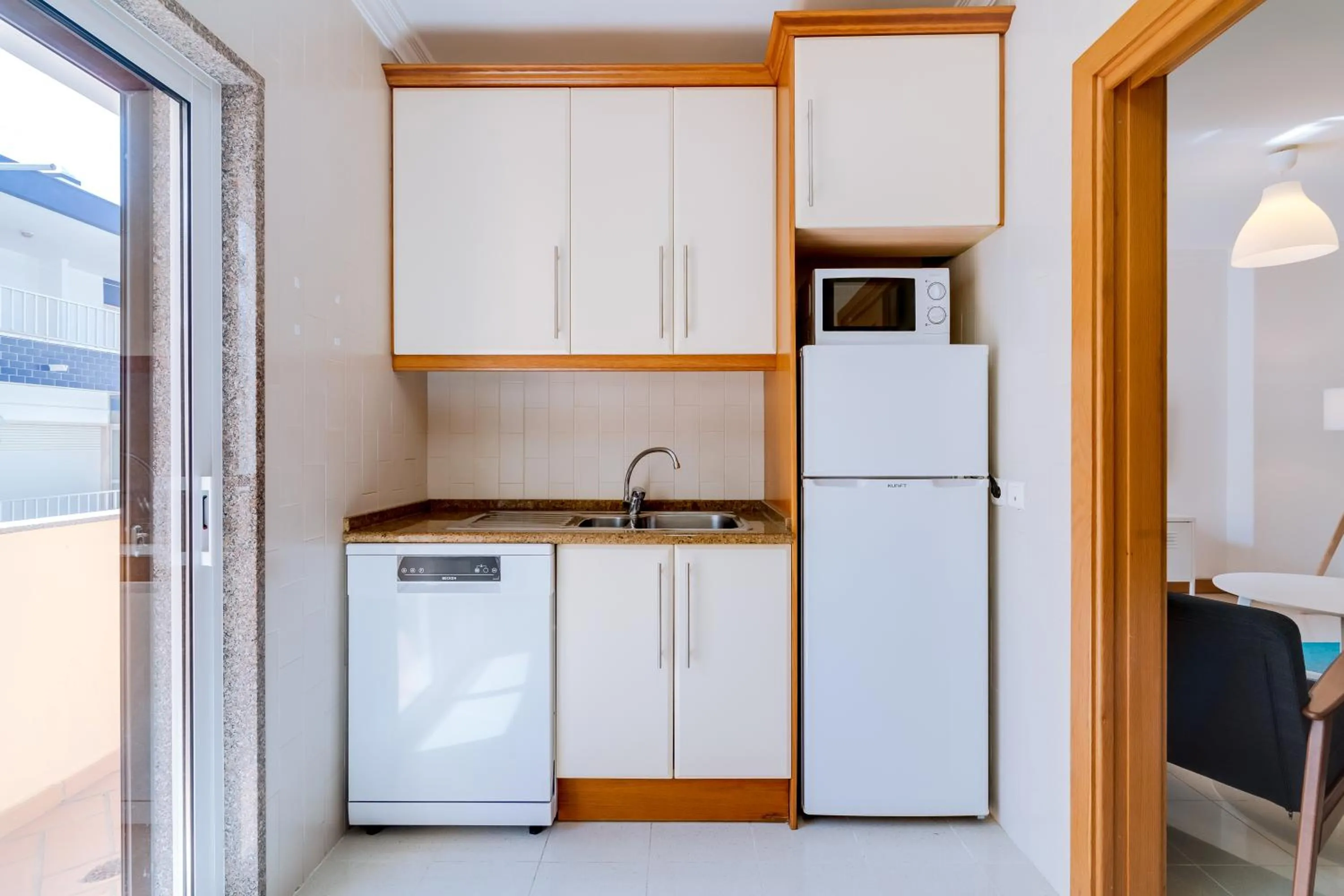 Kitchen or kitchenette in AL- Apartamentos Novos Vista Mar