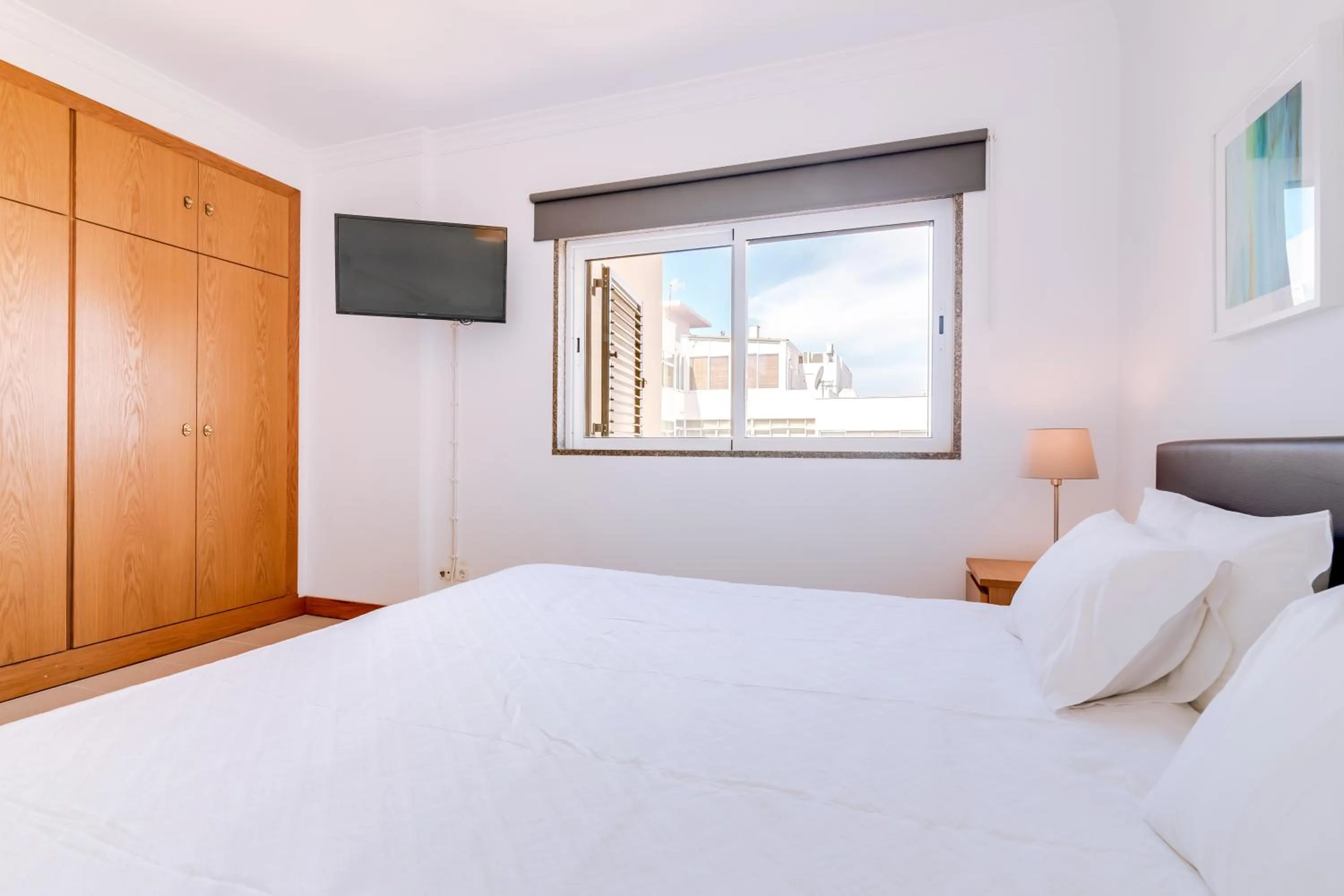 TV and multimedia, Bed in AL- Apartamentos Novos Vista Mar