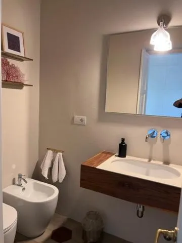 Bathroom in Porto Sole Rooms