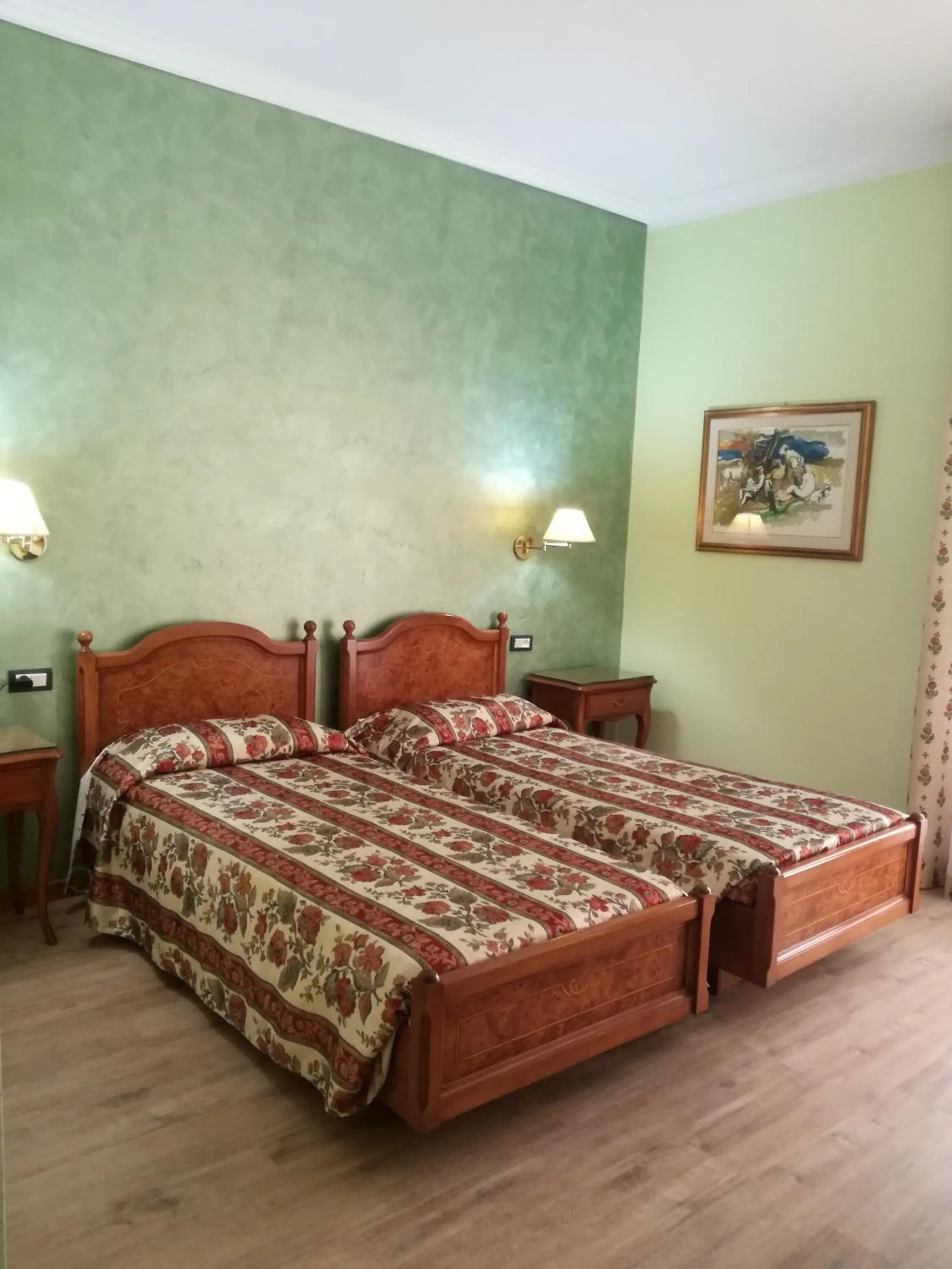 Bed in FILIPPONE HOTEL&RISTORANTE