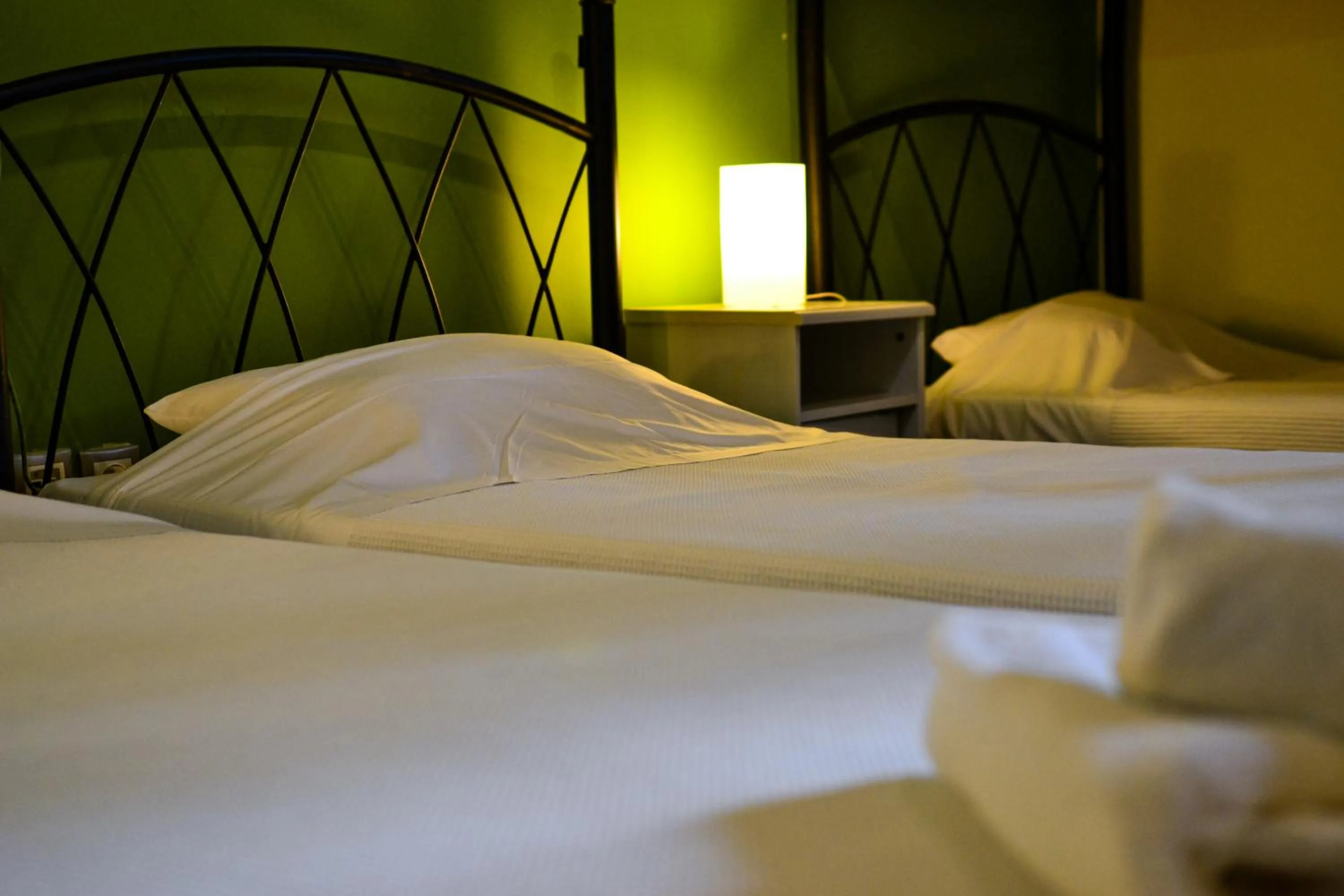 Bed in RentRooms Thessaloniki