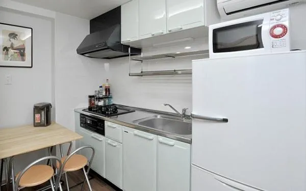 Kitchen or kitchenette in BJ family inn