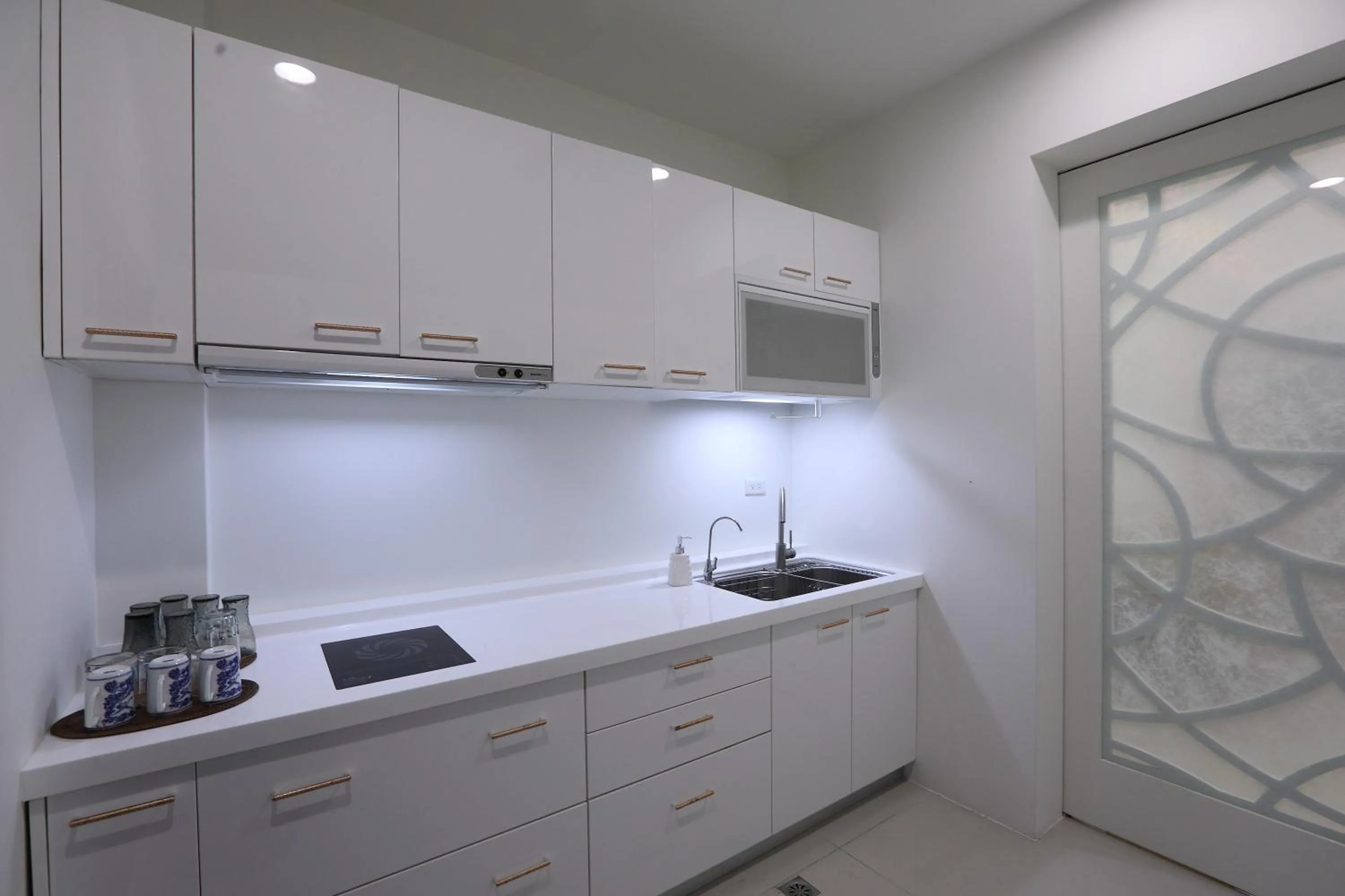 Communal kitchen in 醇境民宿市區車庫停車場