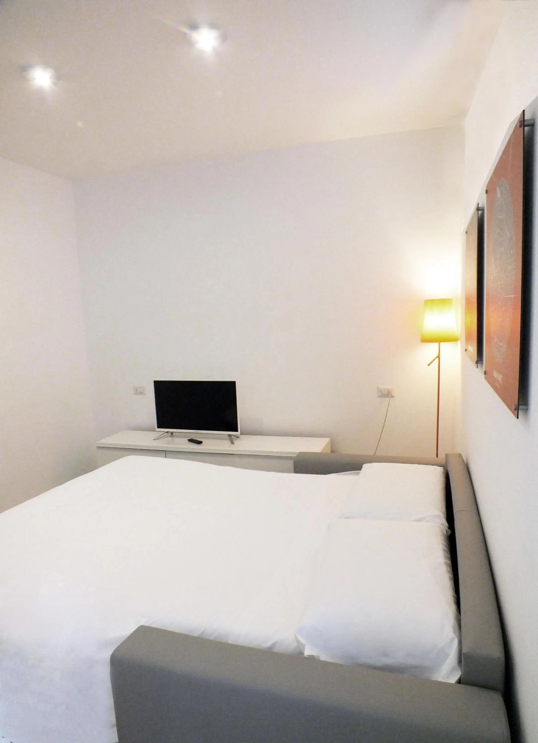 Bed in BB Hotels Aparthotel Visconti