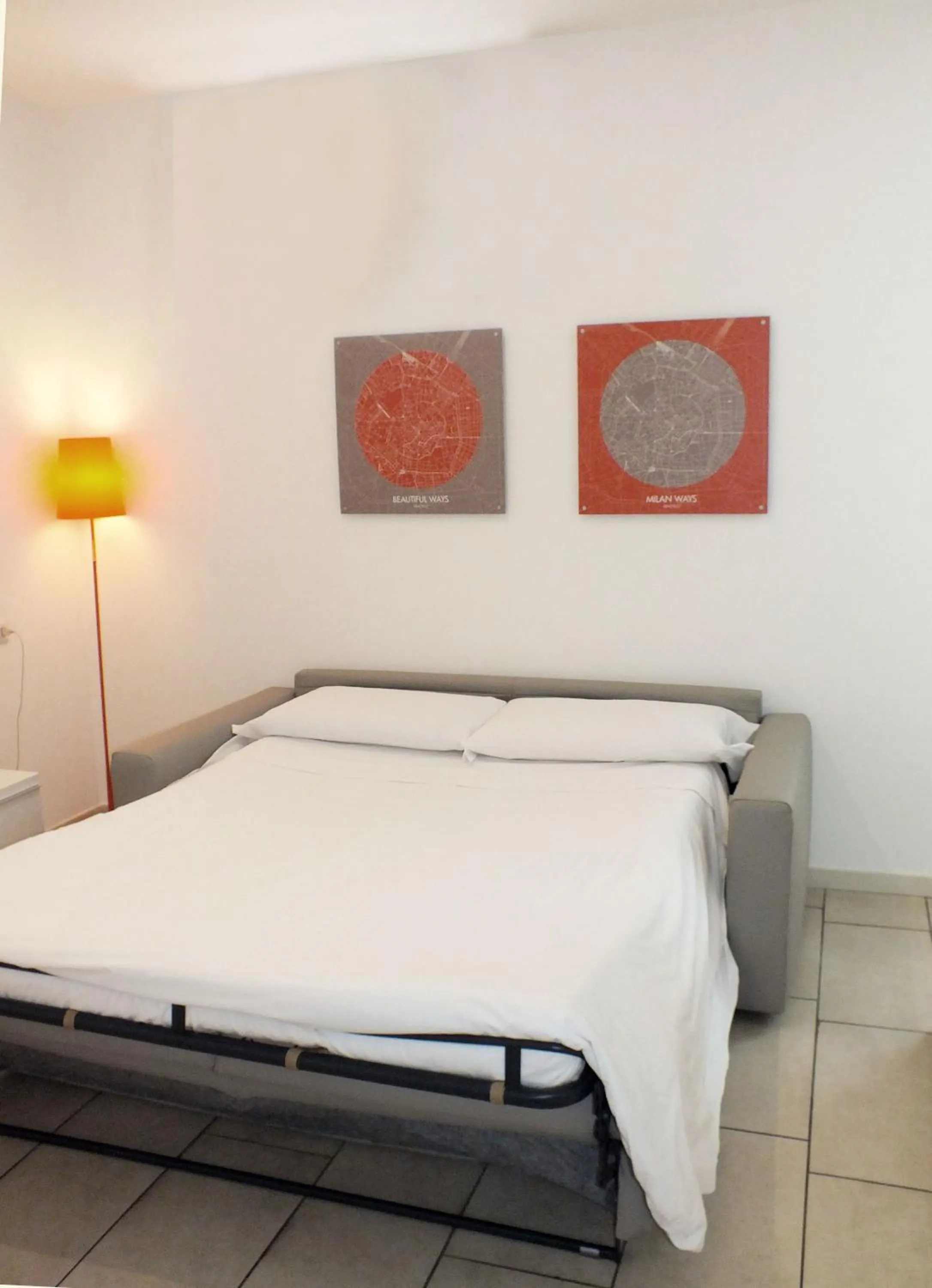 Living room, Bed in BB Hotels Aparthotel Visconti