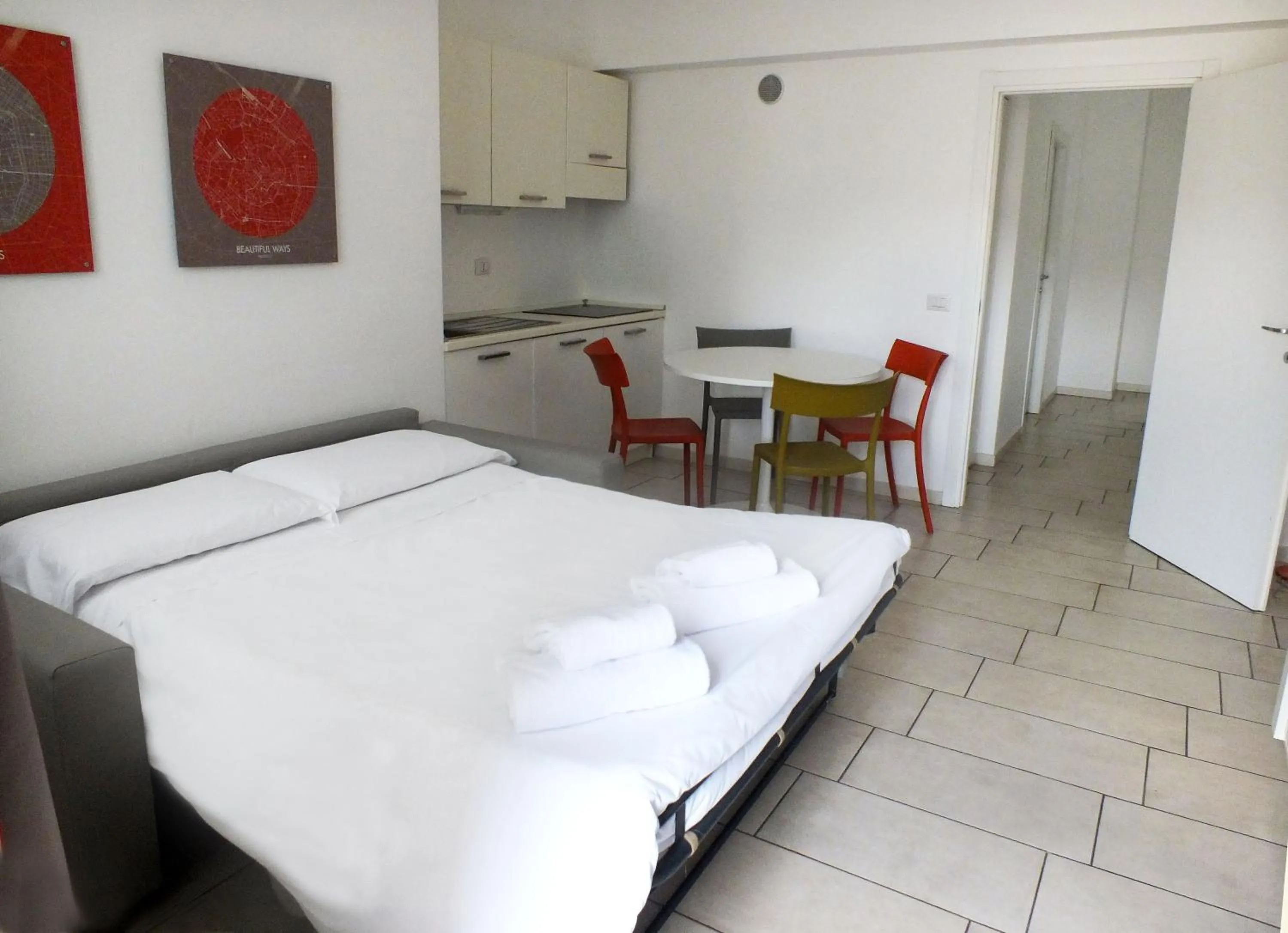 Living room, Bed in BB Hotels Aparthotel Visconti