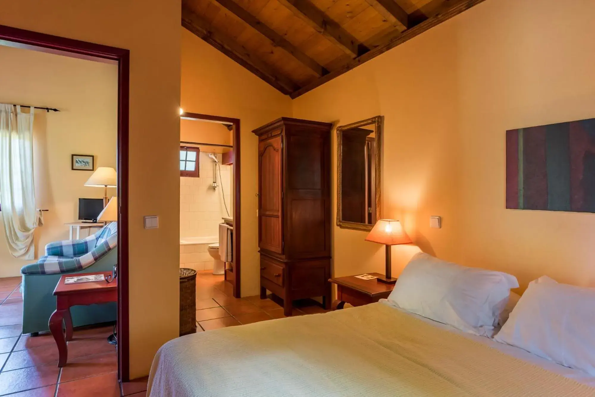 Living room, Bed in Pestana Quinta do Arco Nature & Rose Garden Hotel Living room, Bed in Pestana Quinta do Arco Nature & Rose Garden Hotel