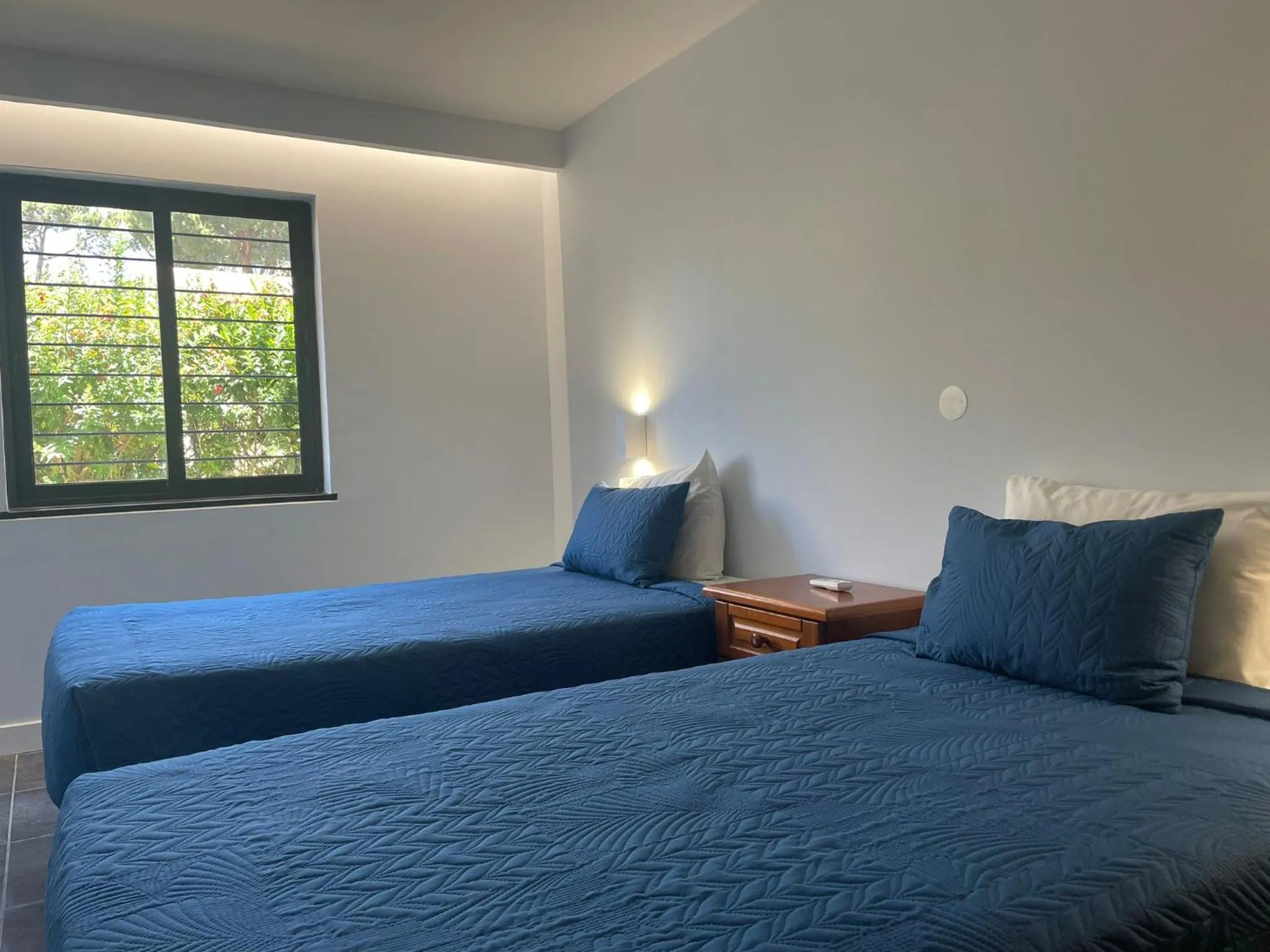 Bed in Apartamentos Honorio - Pool and Garden