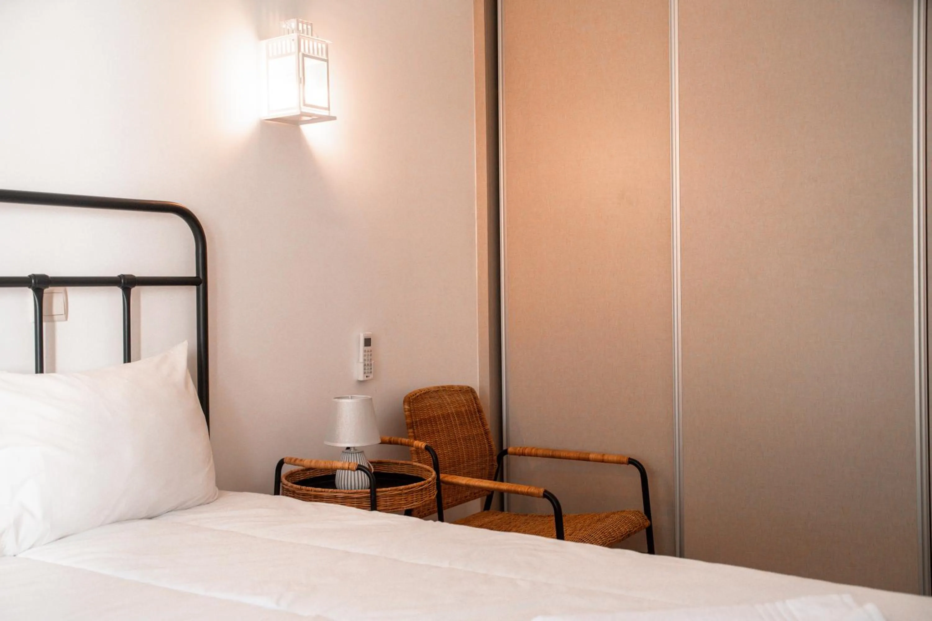 Bed in Apartamentos Honorio - Pool and Garden