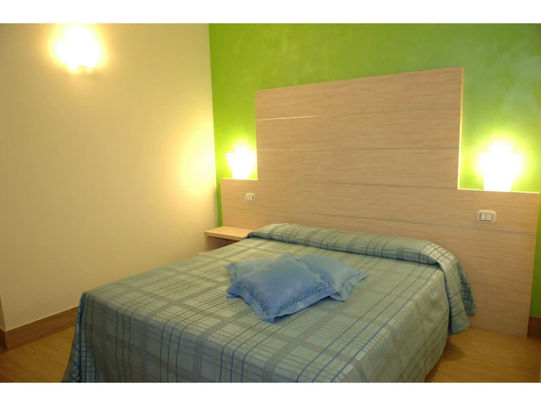 Photo of the whole room, Bed in Hotel La Rosa dei Venti Photo of the whole room, Bed in Hotel La Rosa dei Venti