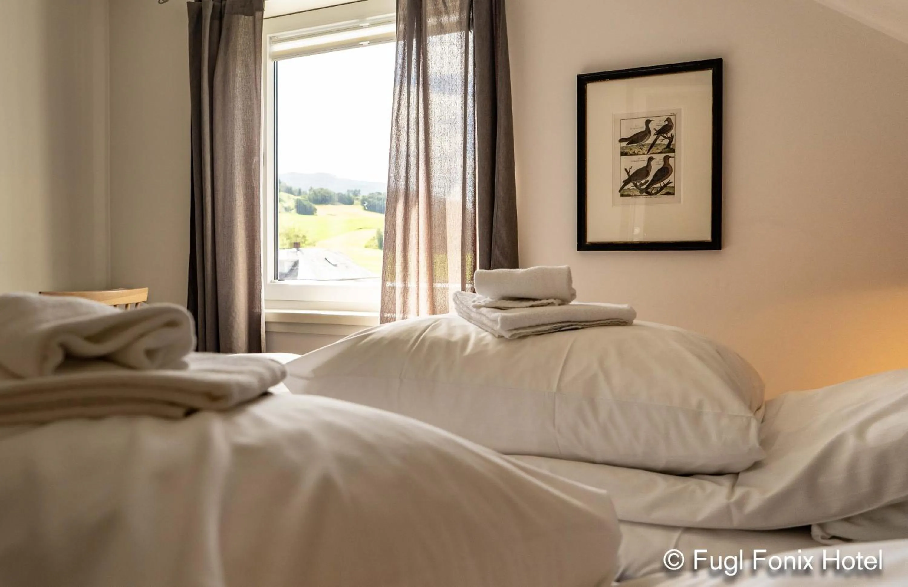 Bed in Fugl Fønix Hotel