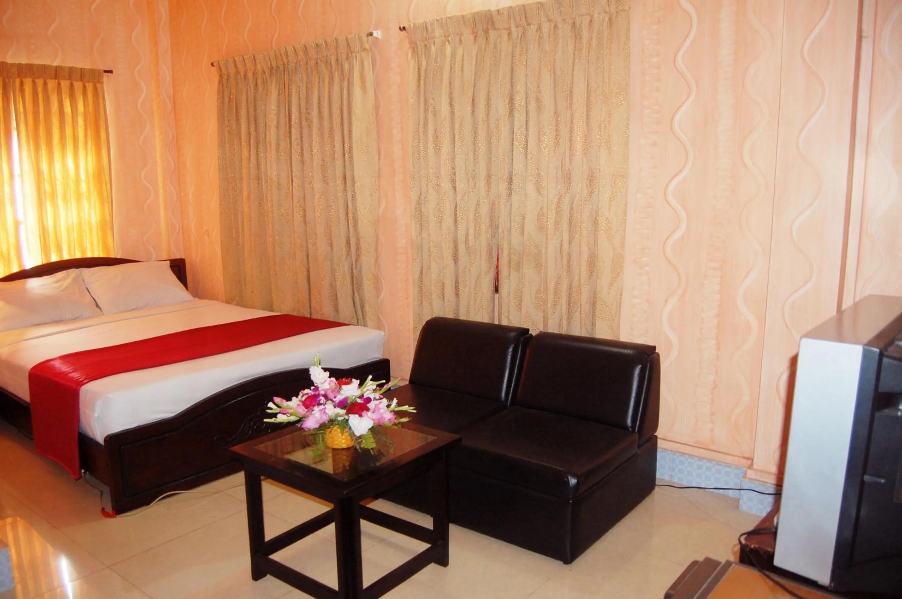 Bed in Hotel Swiss Garden International