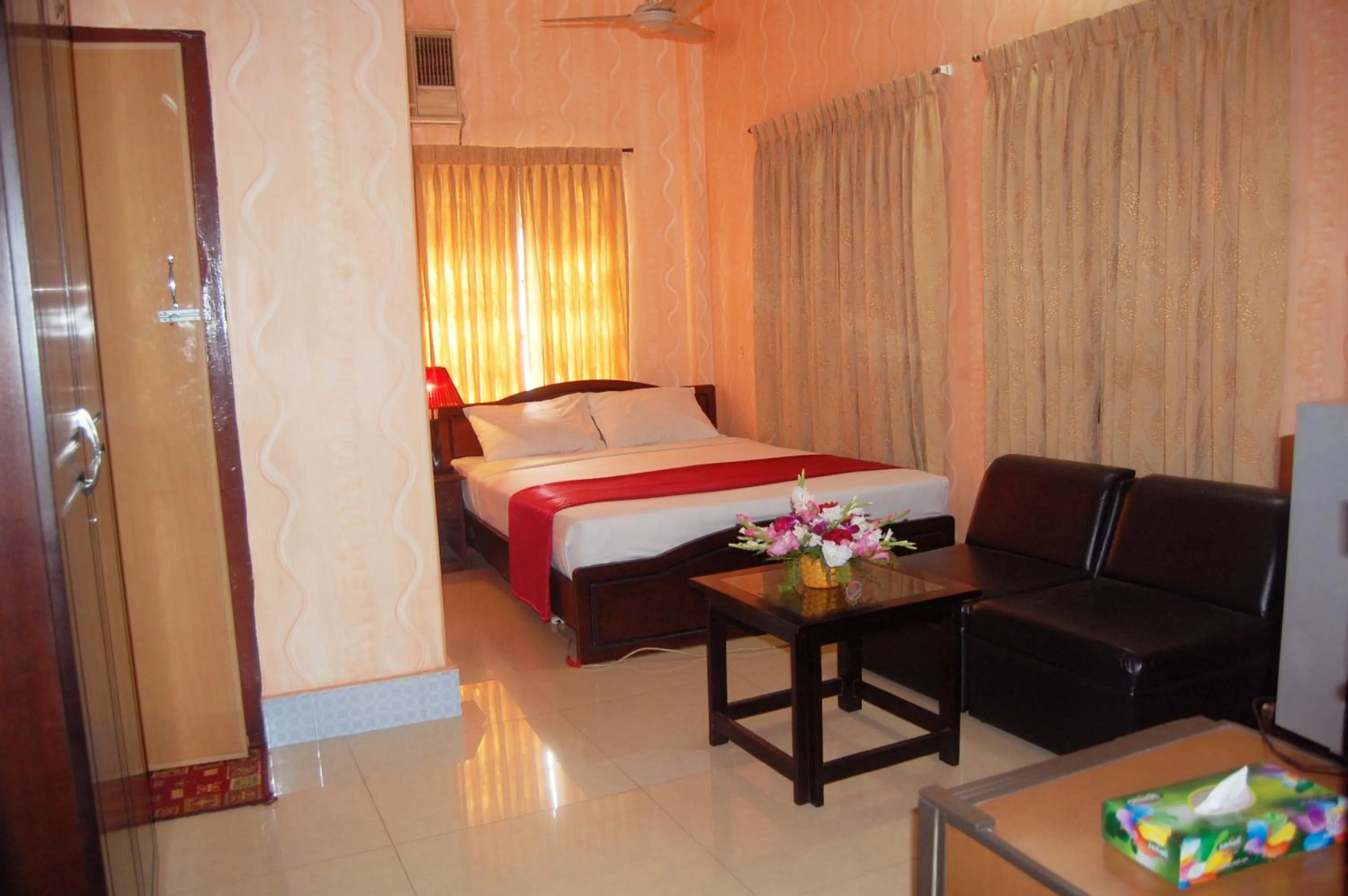 Bed in Hotel Swiss Garden International