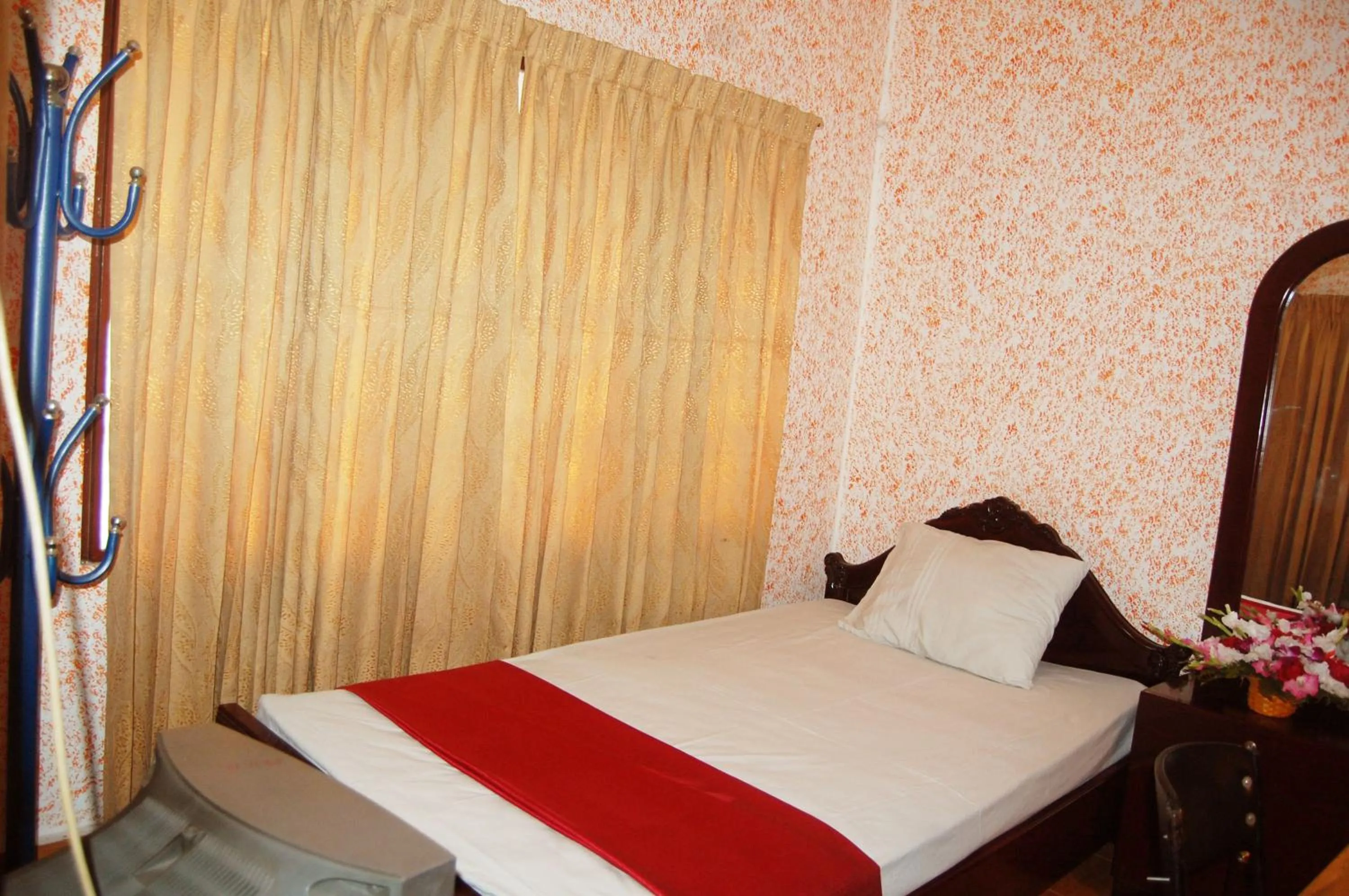 Bed in Hotel Swiss Garden International