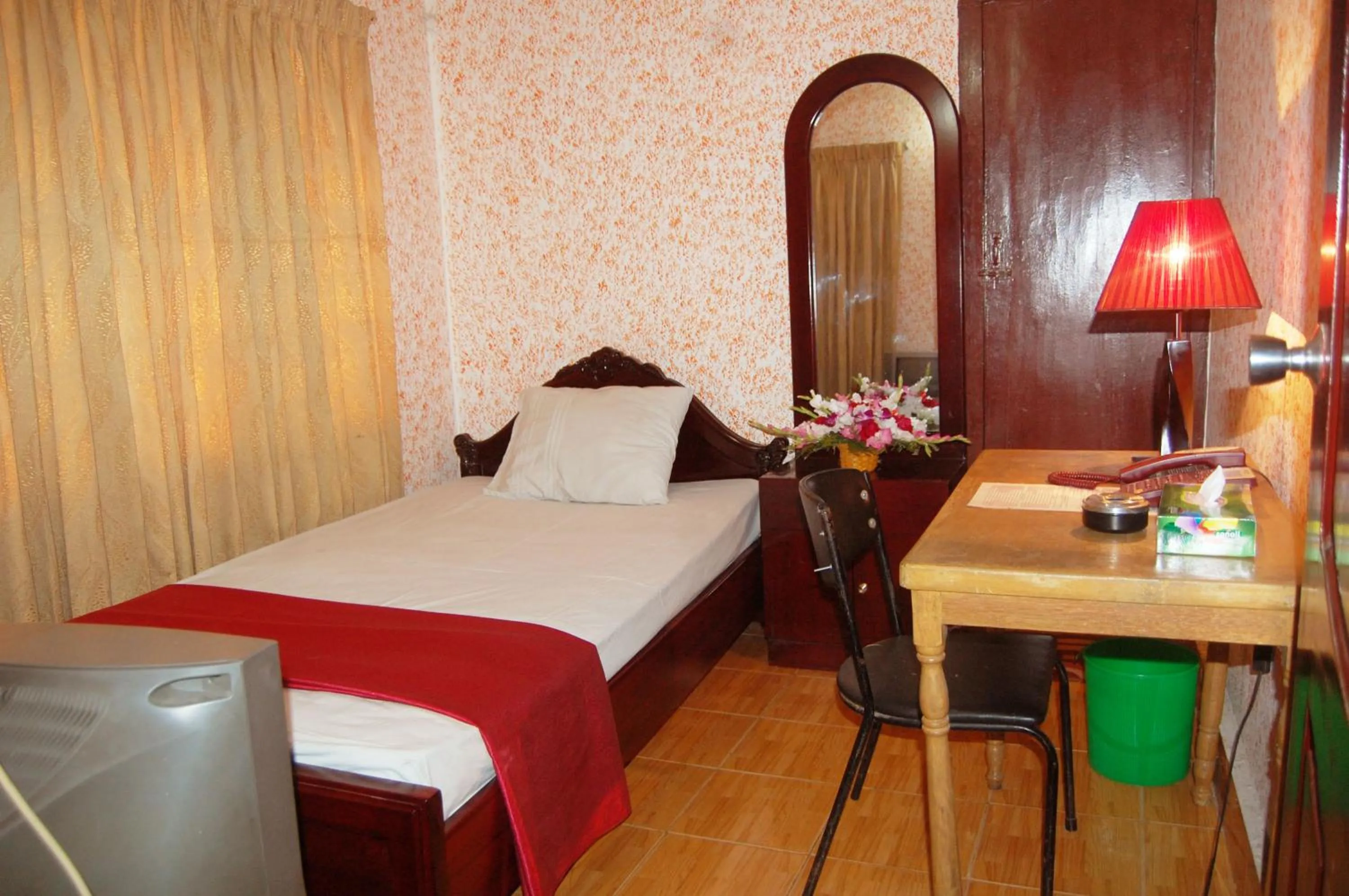 Bed in Hotel Swiss Garden International