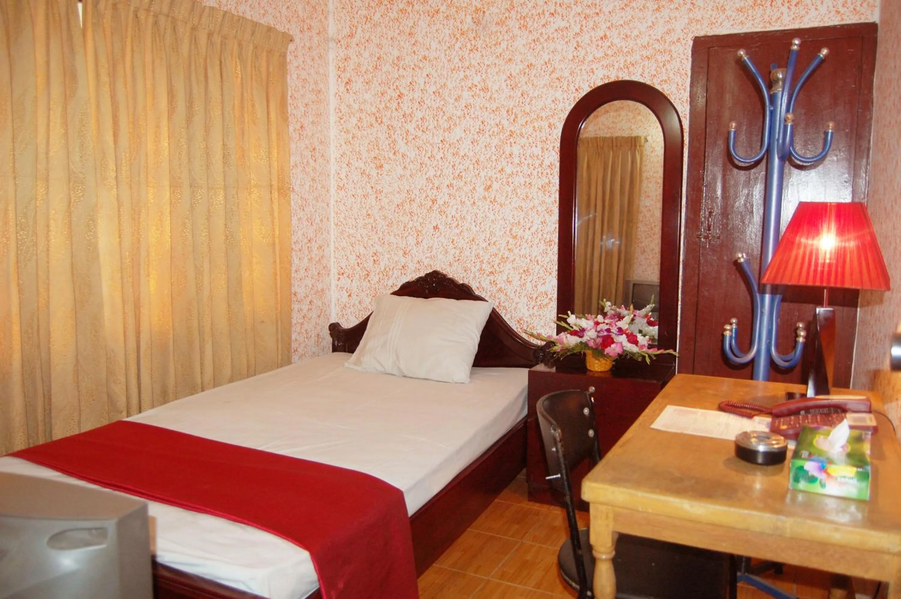 Bed in Hotel Swiss Garden International